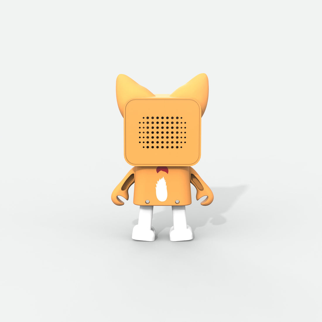 Żółty głośnik w kształcie robota. Ma kwadratową głowę z kropkami i dwoma uszami.