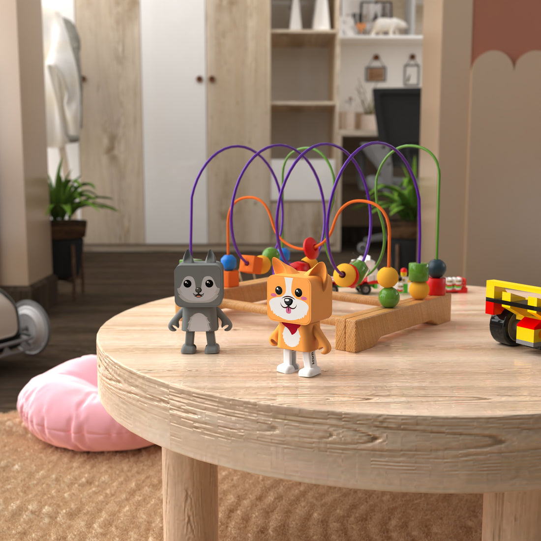 Drewniany stół z zabawkami w postaci psów i labiryntem z koralików. Dwa psy zabawki stoją naprzeciwko siebie. Tło rozmyte.