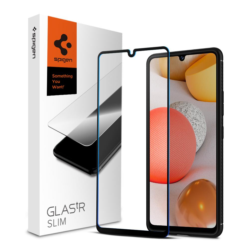 Pudełko z ochraniaczem ekranu i telefonem. Telefon ma kolorowe tło na ekranie.