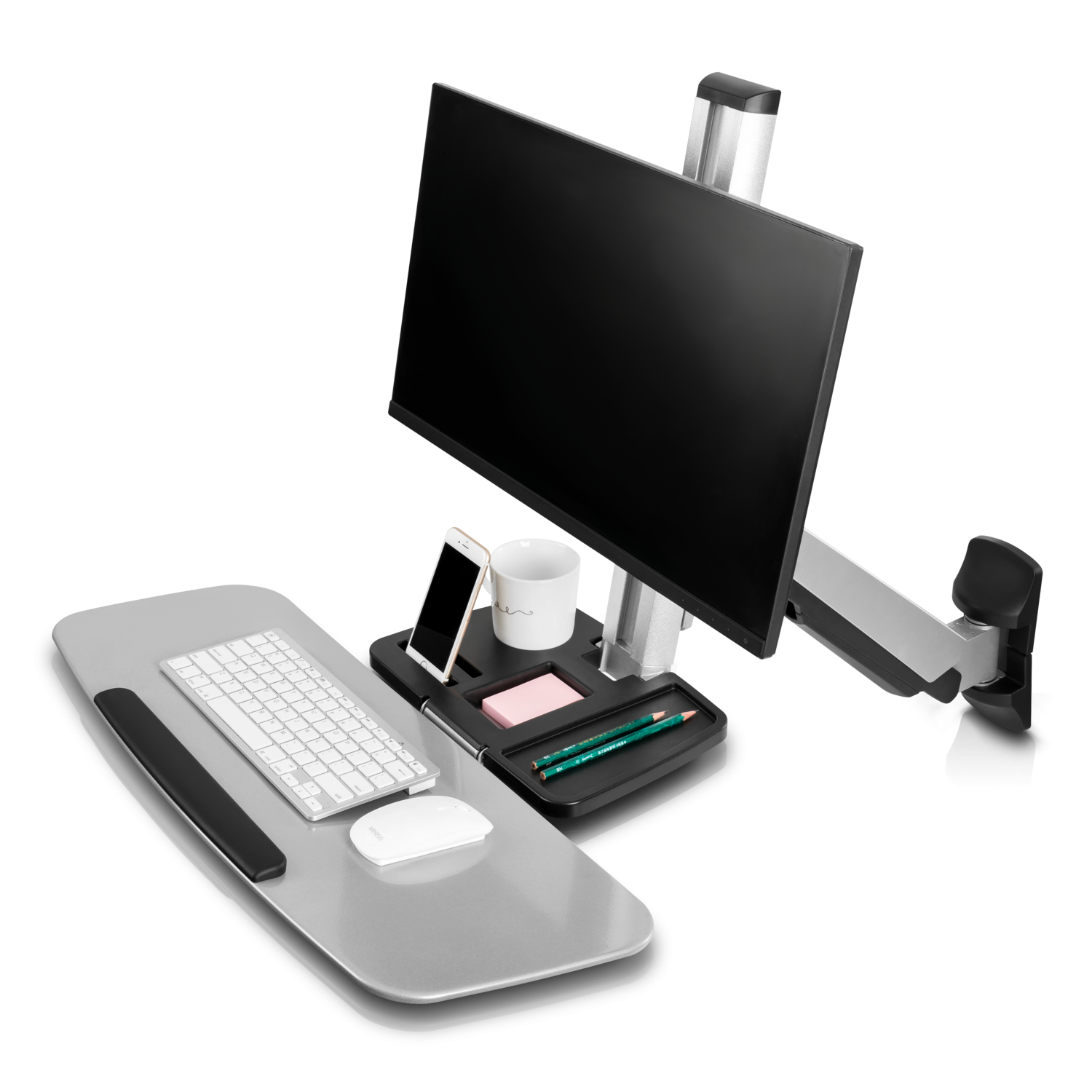 Arbeitsplatz: Monitor, Tastatur, Maus, Telefon und Becher auf grauem Schreibtisch mit Monitorarm.