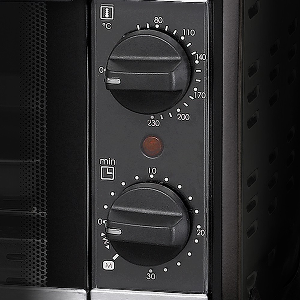 Sterowanie piekarnikiem z pokrętłami temperatury i czasu oraz czerwoną lampką kontrolną.