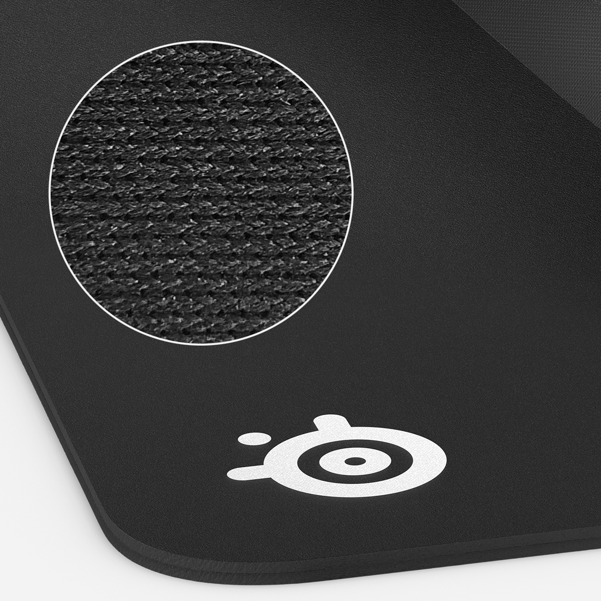 Black mouse pad with white logo, and a circular macro shot of the textured surface.