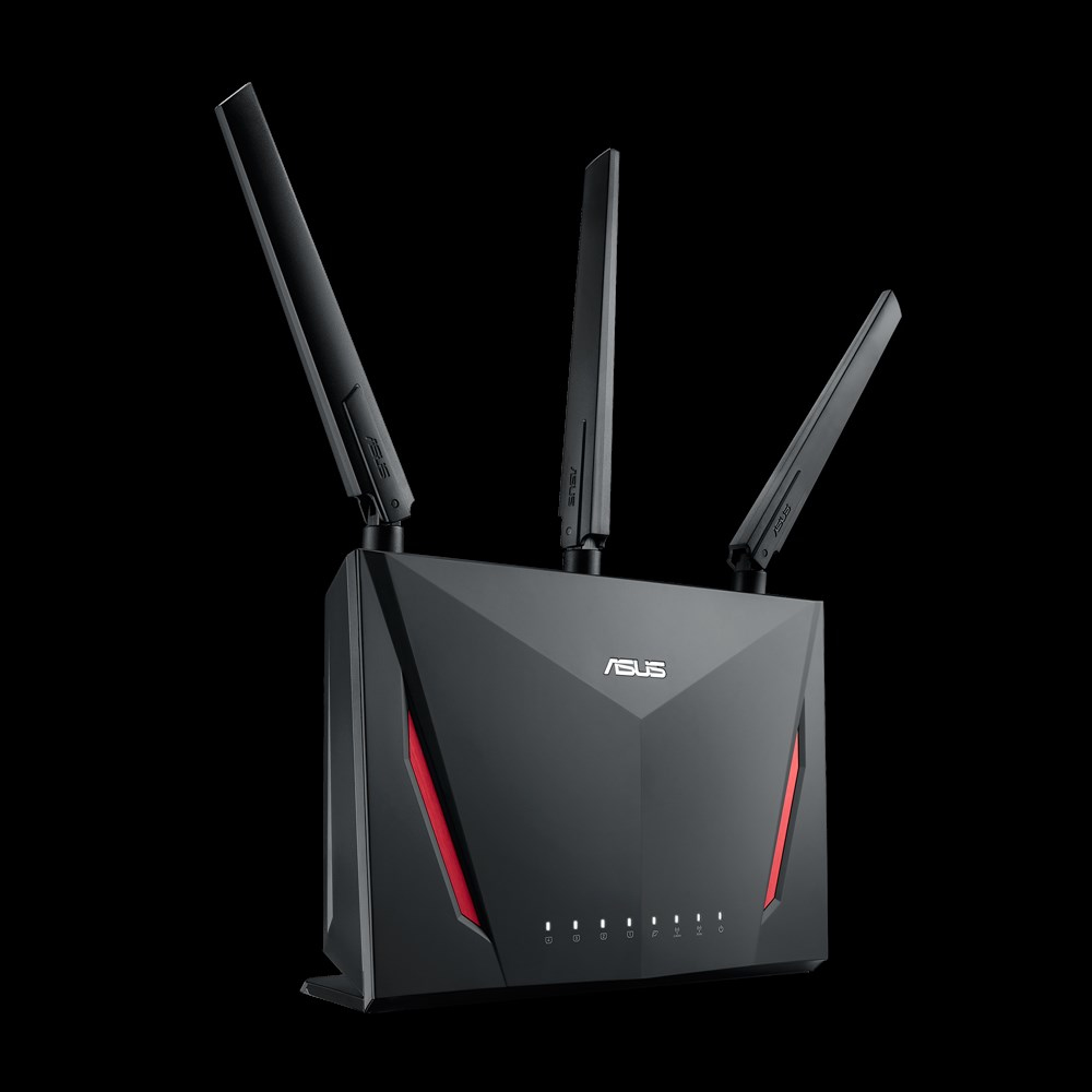 Czarny router z trzema antenami, czerwonymi akcentami i logo ASUS na czarnym tle.