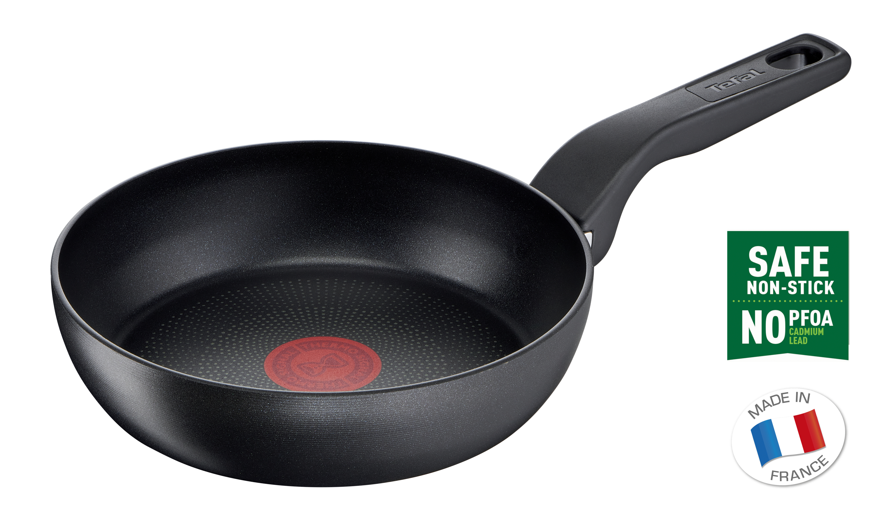 Black frying pan with a red circle in the middle, on a white background.