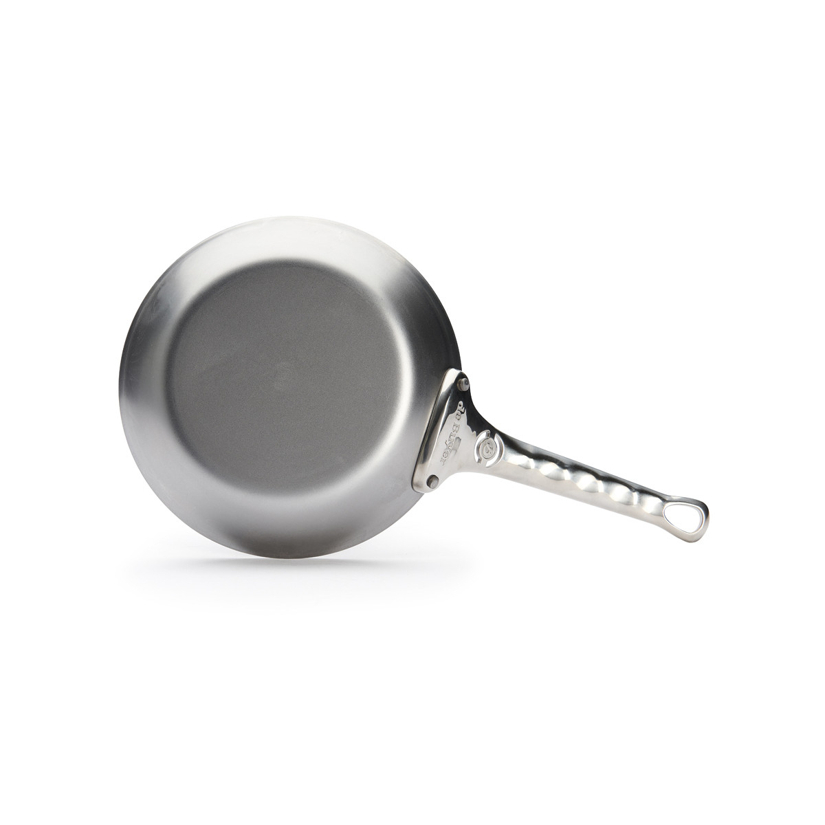 Underside view of a silver frying pan with a long handle. Isolated on white background.