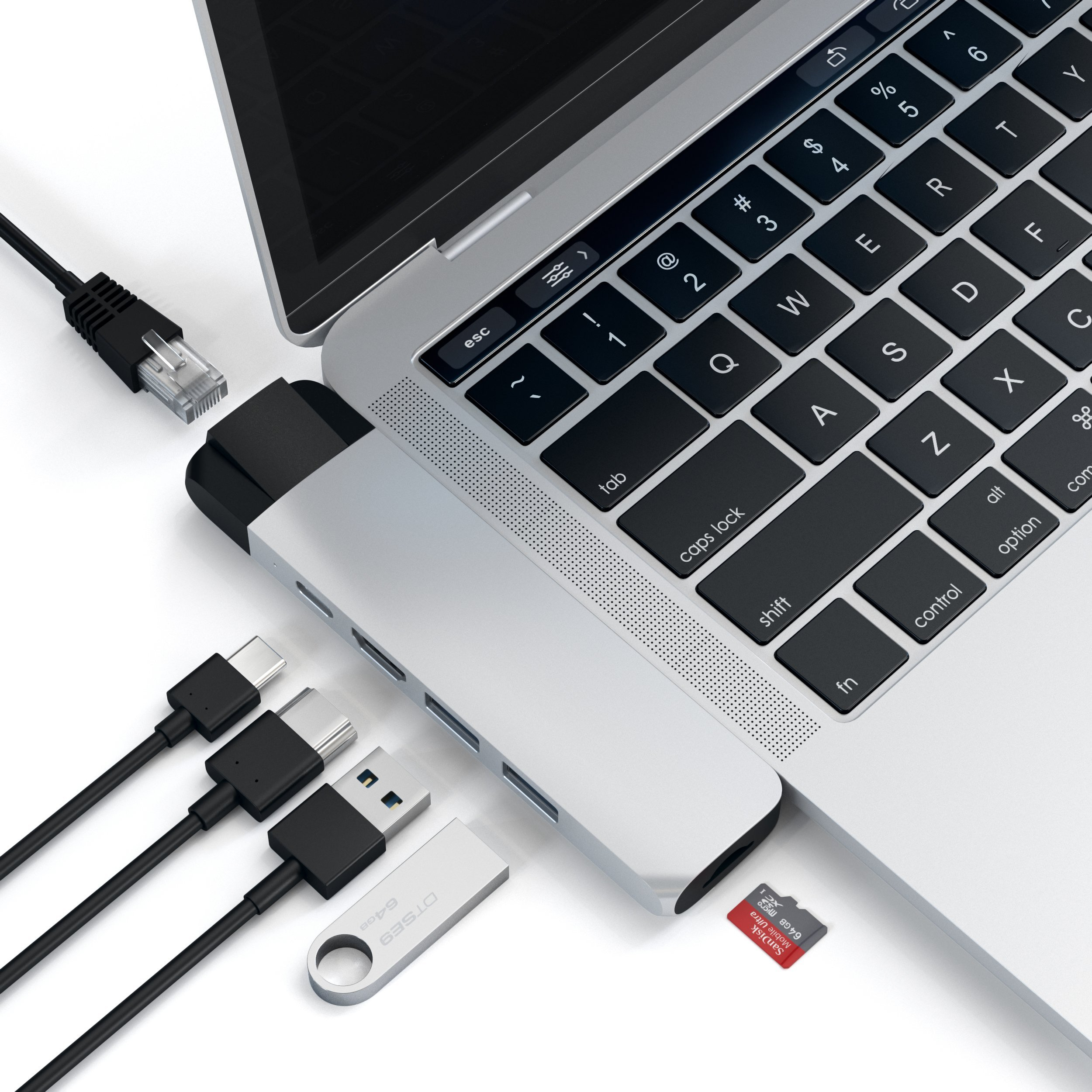 Ein Laptop mit angeschlossenen USB-, USB-C-, Ethernet- und SD-Kartenanschlüssen sowie einem USB-Laufwerk.