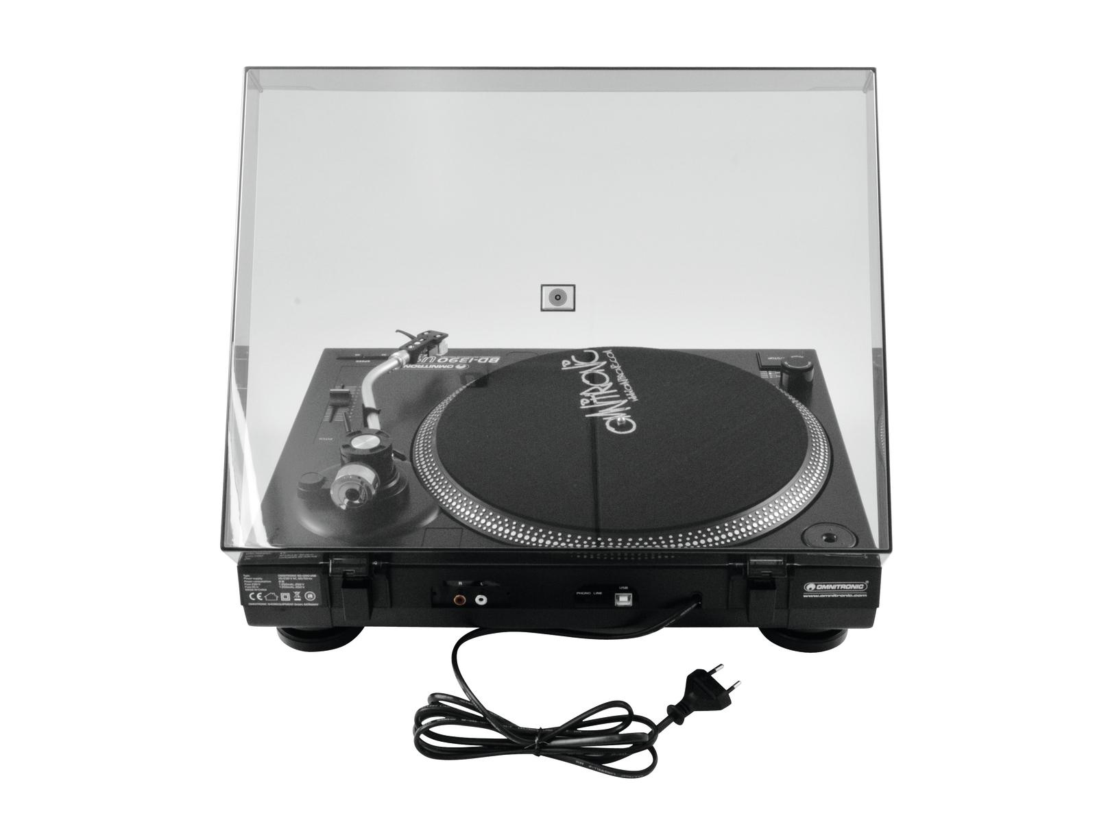 Tocadiscos con cubierta transparente sobre fondo blanco.