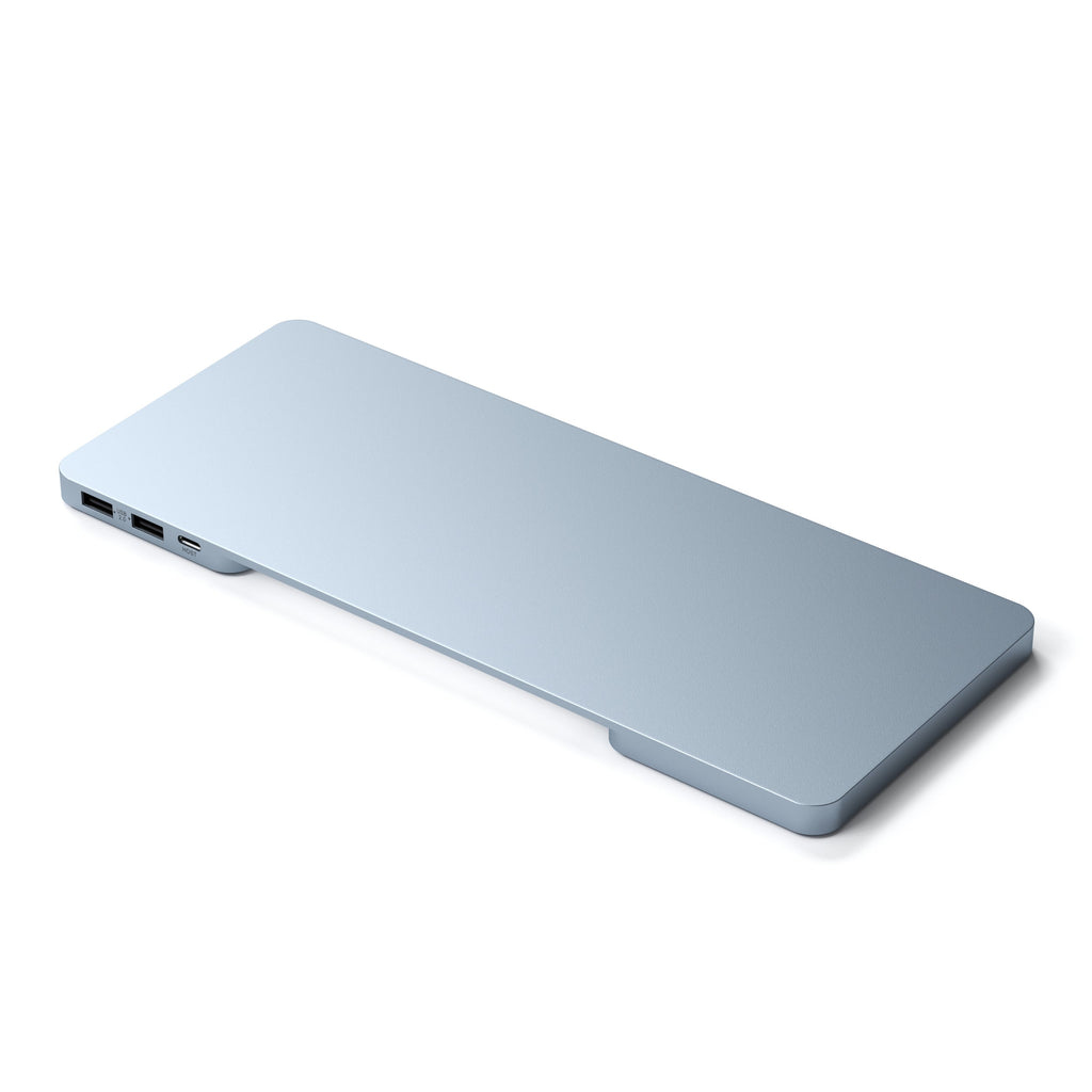 Ein hellblaues, rechteckiges Gerät mit zwei USB-Anschlüssen. Es ist ein Laptop-Ständer, isoliert.