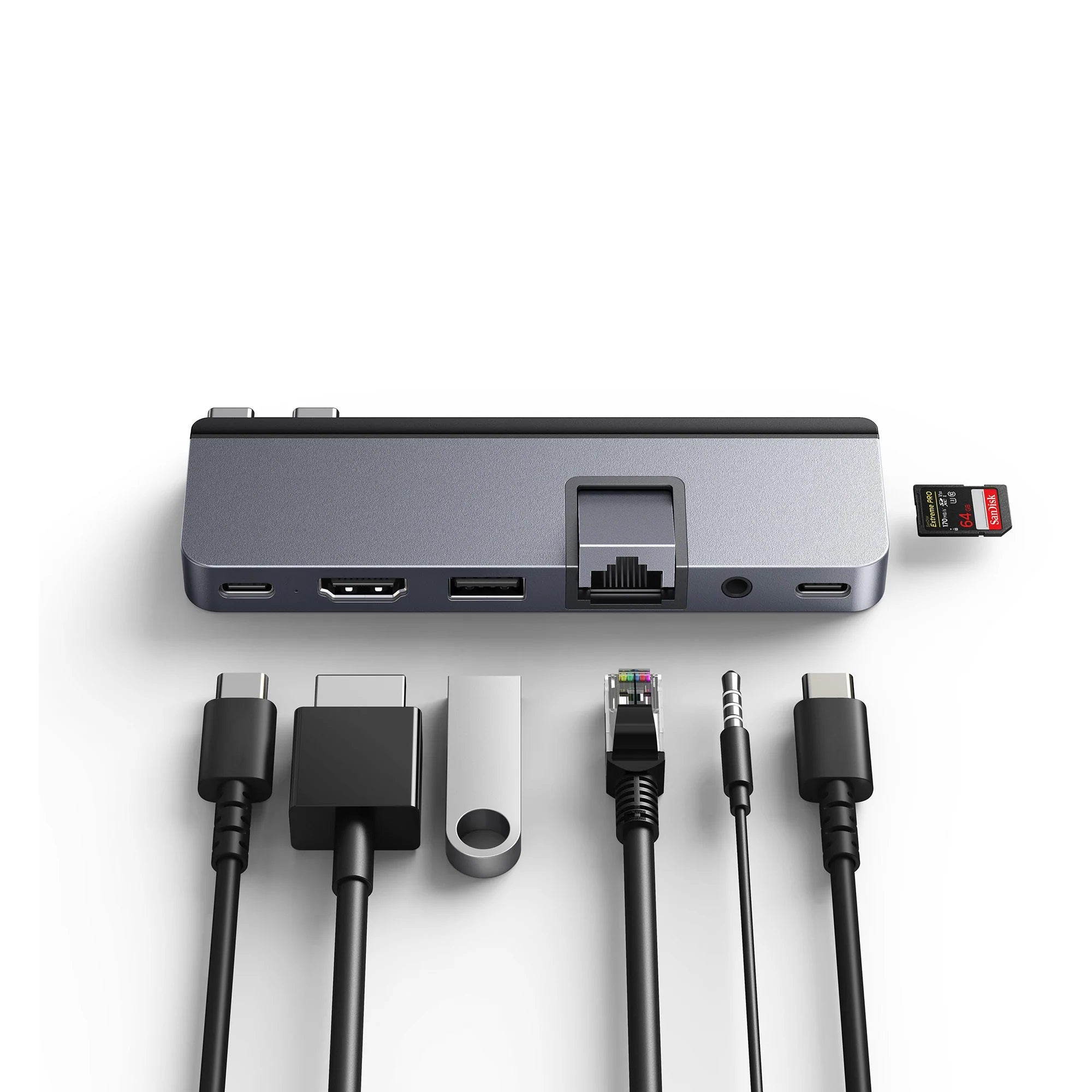 Un concentrador gris con varios cables conectados, incluyendo USB y HDMI.