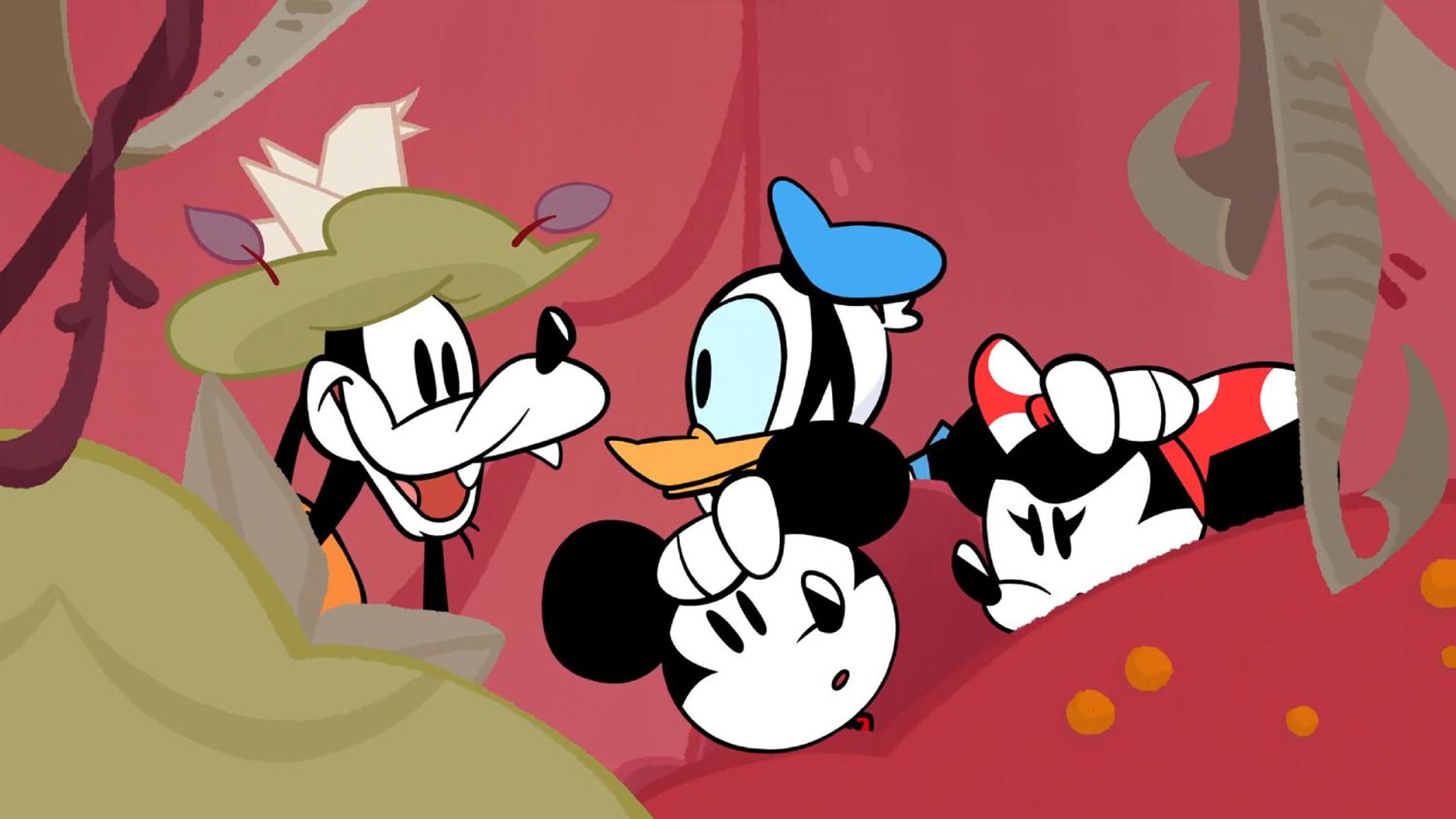 Postacie z kreskówek Myszka Miki, Myszka Minnie, Kaczor Donald i Goofy uśmiechają się w kolorowej scenie.