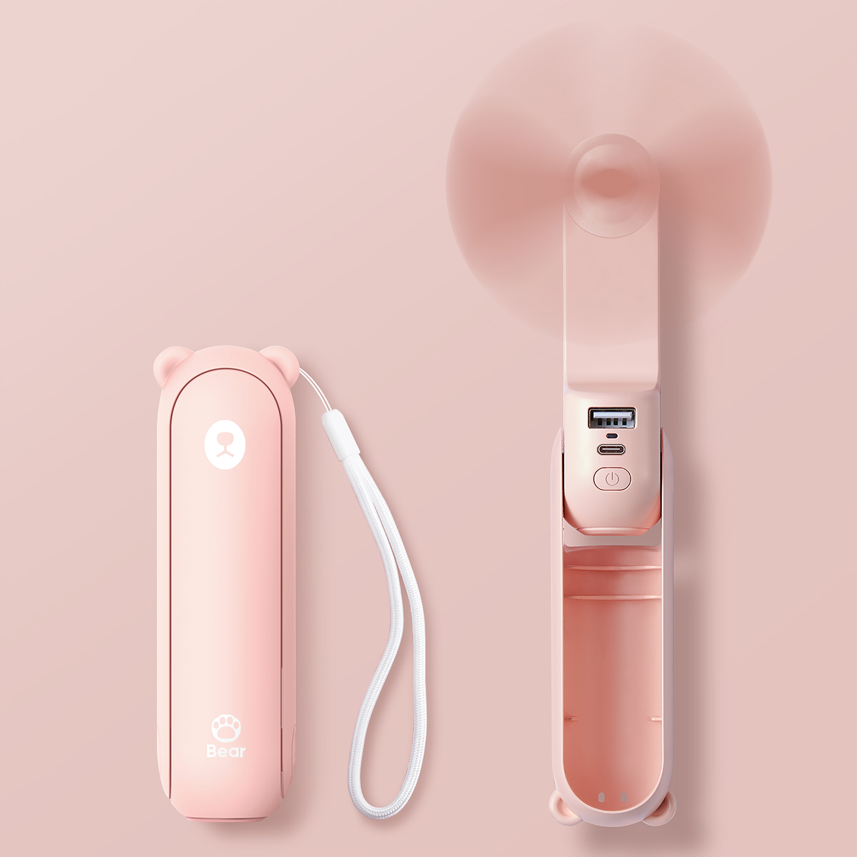 Pembe ayı şeklinde fan, katlanmış ve açık, pembe arka plan üzerinde kayışlı.