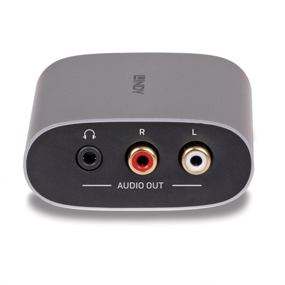 Grauer Audioadapter mit Kopfhörer- und Cinch-Anschlüssen. Beschriftet mit 'Audio Out'.