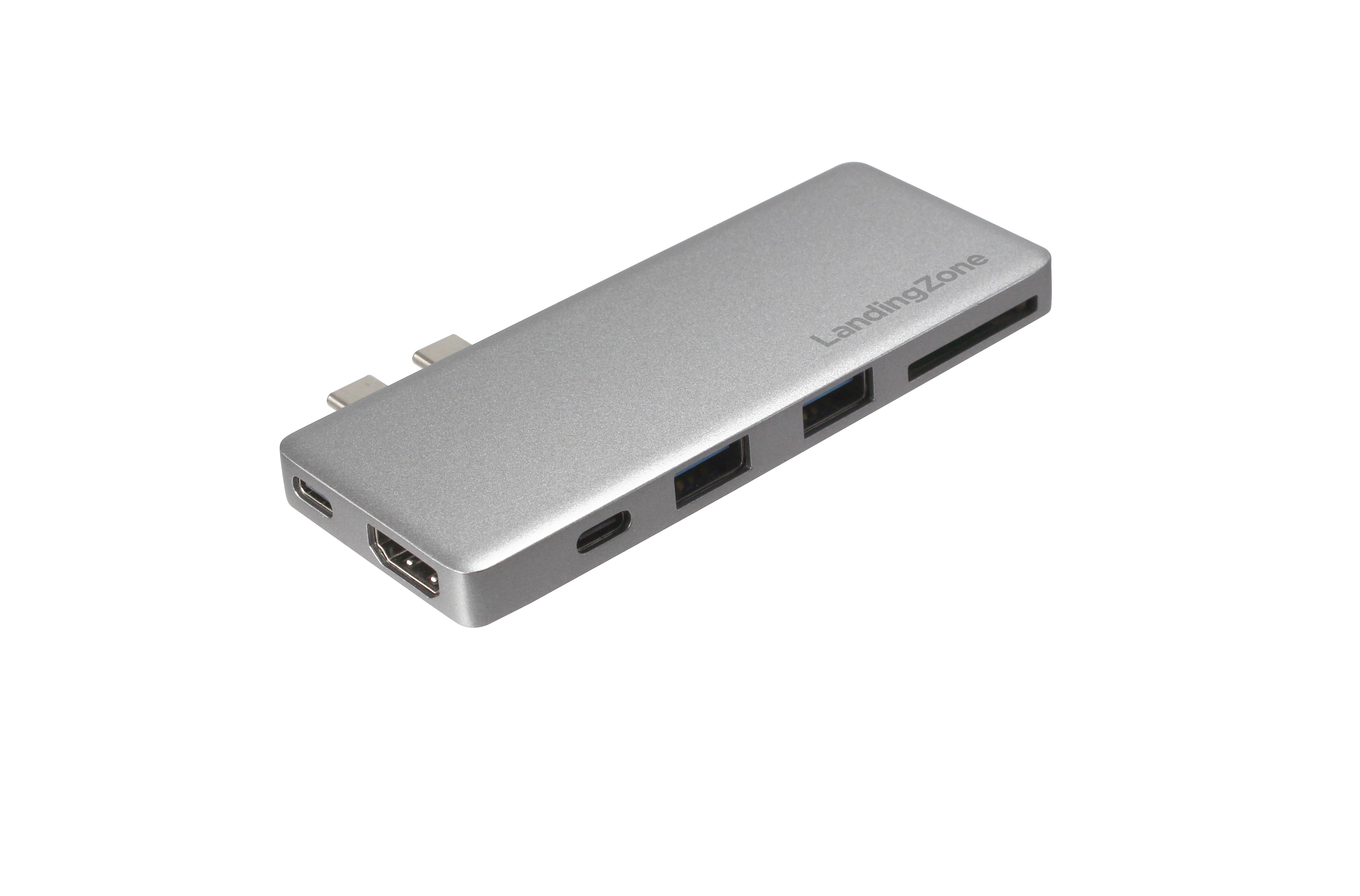 Silberfarbener Hub mit mehreren Anschlüssen. Verfügt über USB-, HDMI- und Kartenleser-Steckplätze.