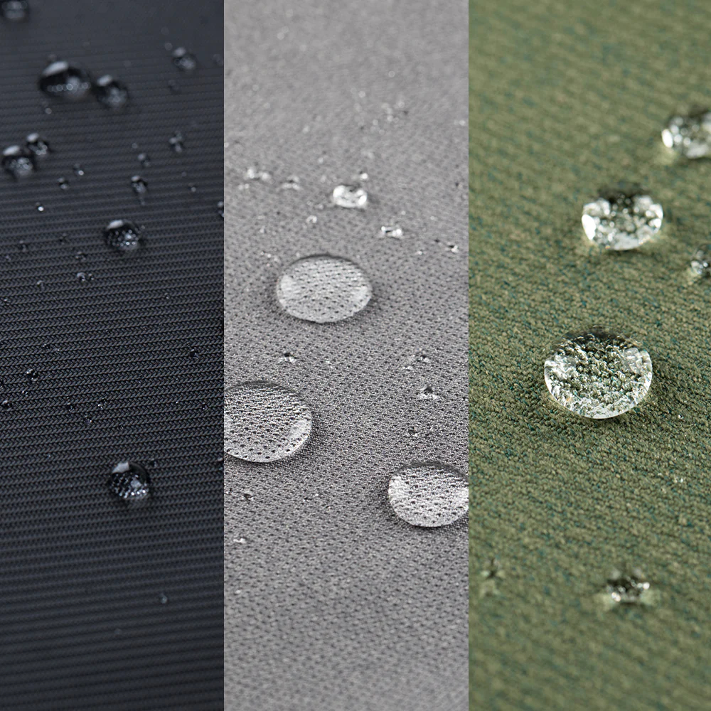Drei Stoffmuster mit Wassertropfen. Schwarz, grau und grün.