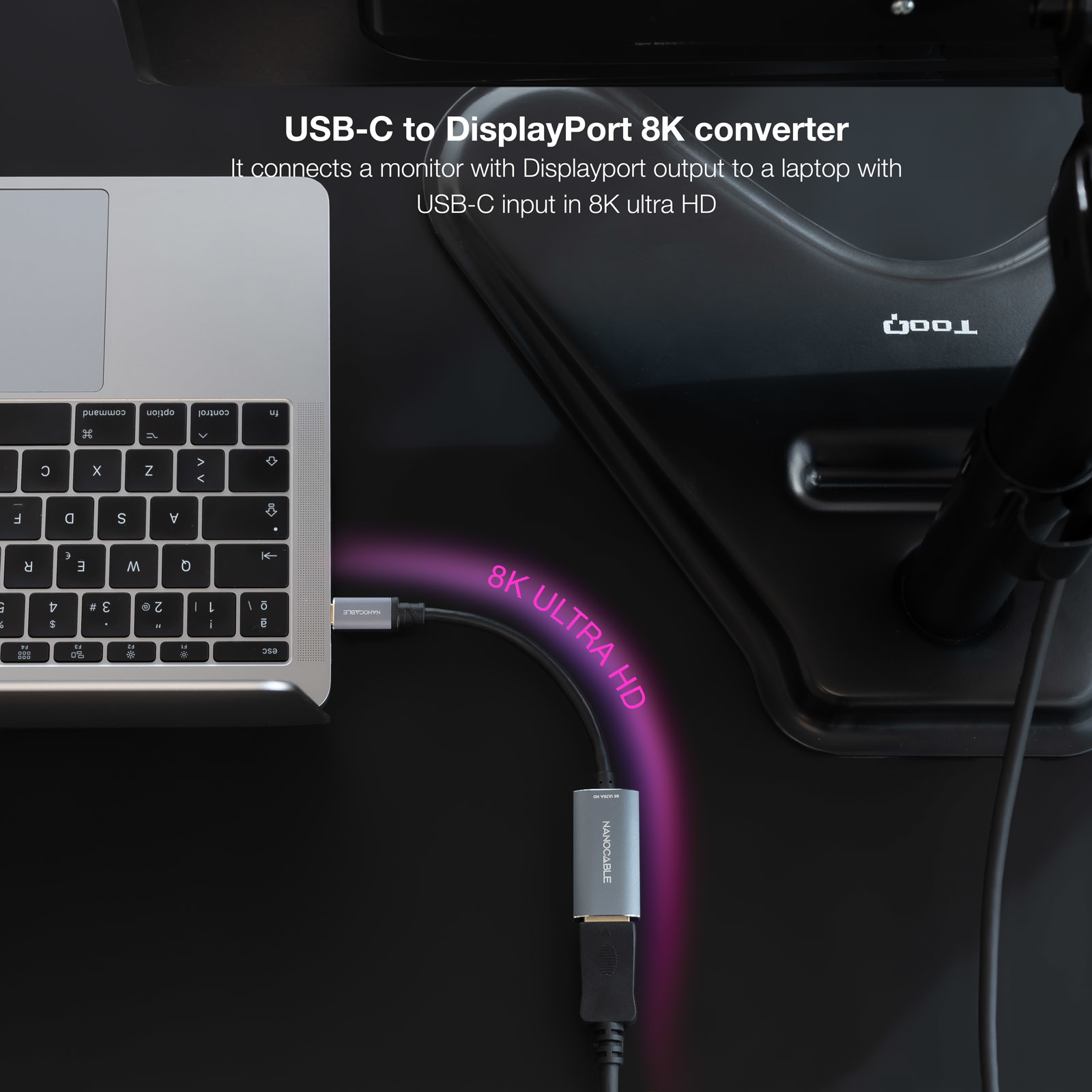 USB-C-zu-DisplayPort-Konverter. Schwarzes Kabel ist mit Laptop und Monitor verbunden.