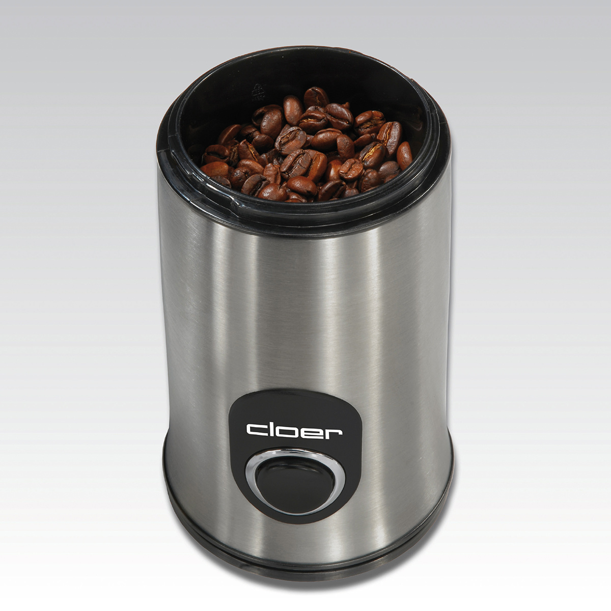 Kaffeemühle aus Edelstahl mit Kaffeebohnen. Sie hat einen schwarzen Knopf.