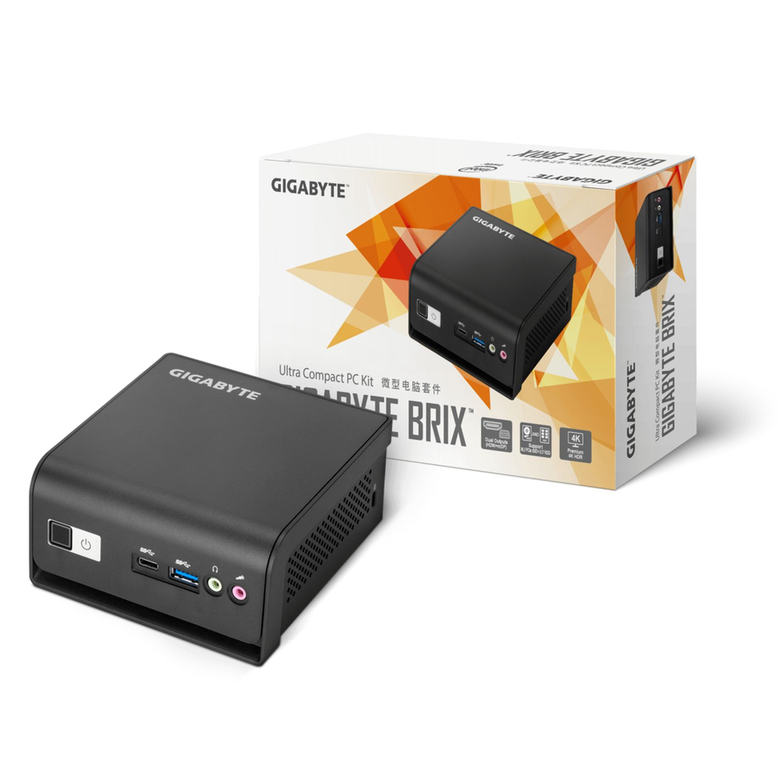 Schwarzes Gigabyte Brix PC-Kit mit einem kleinen, schwarzen PC neben der Box. Weißer Hintergrund.