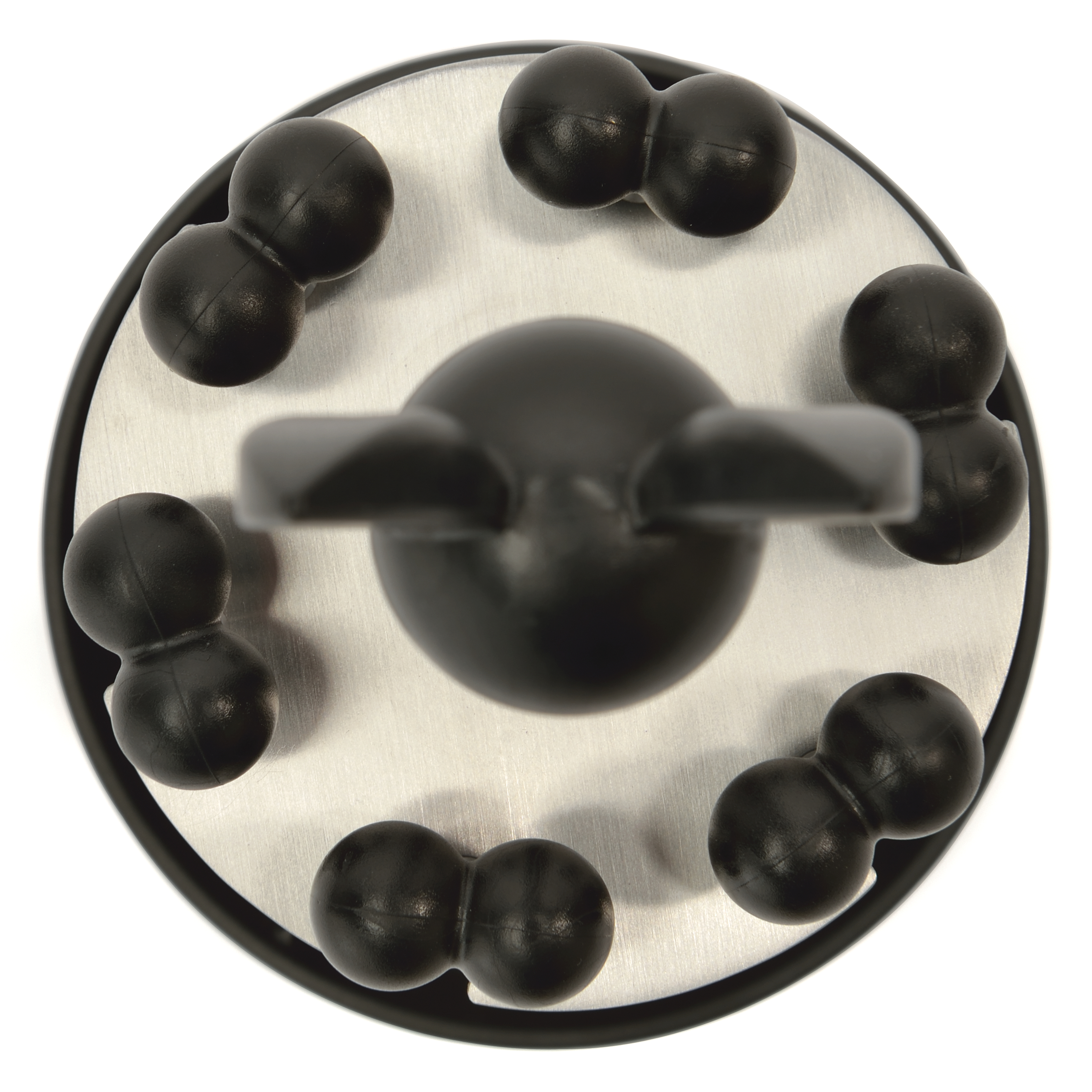 A close-up of a black and silver circular object with small black balls around a central knob.