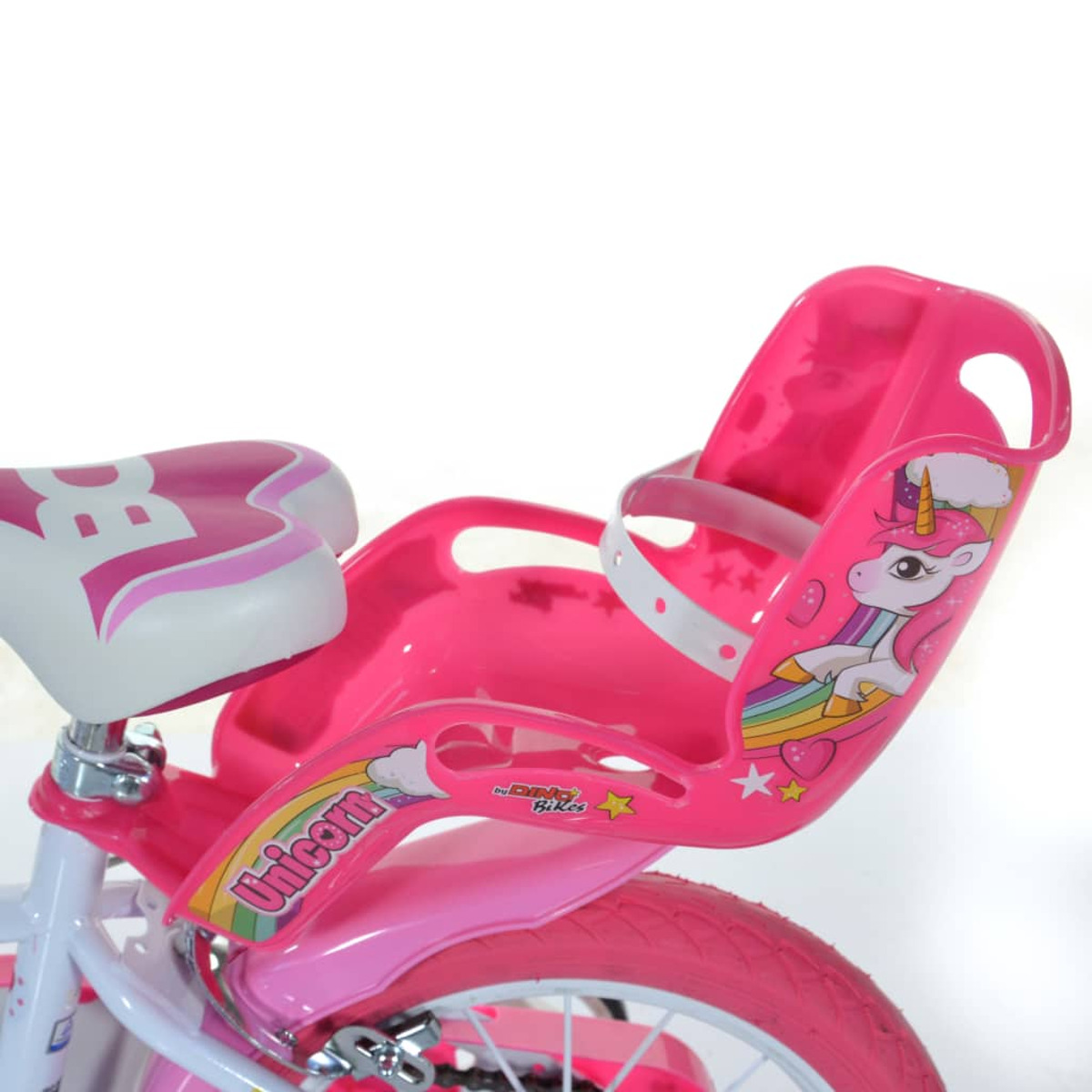 Bicicletta rosa con seggiolino per bambini con design unicorno e arcobaleno. Sfondo bianco.