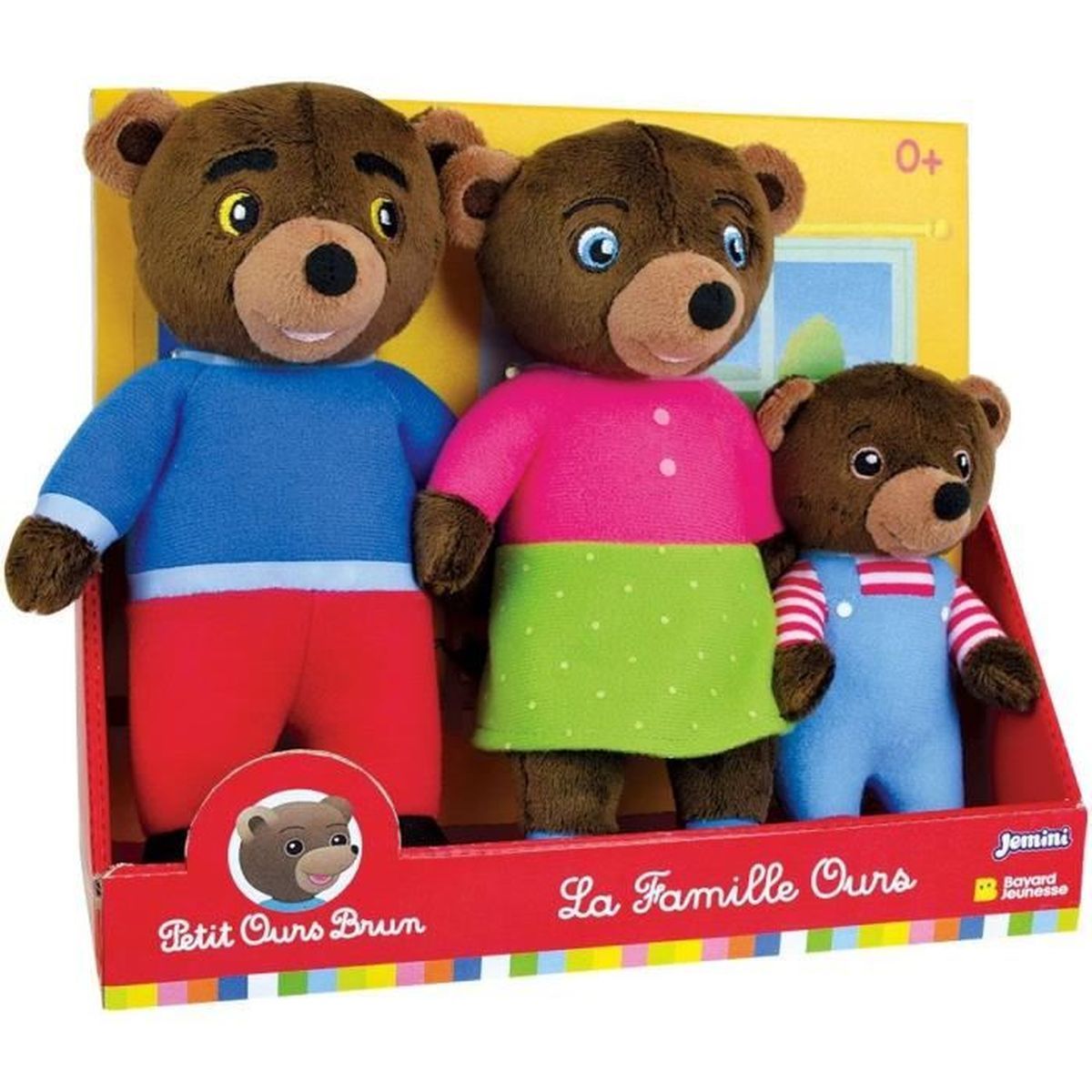 Drei Teddybär-Puppen in einer Box. Sie sind braun mit verschiedenen Outfits.