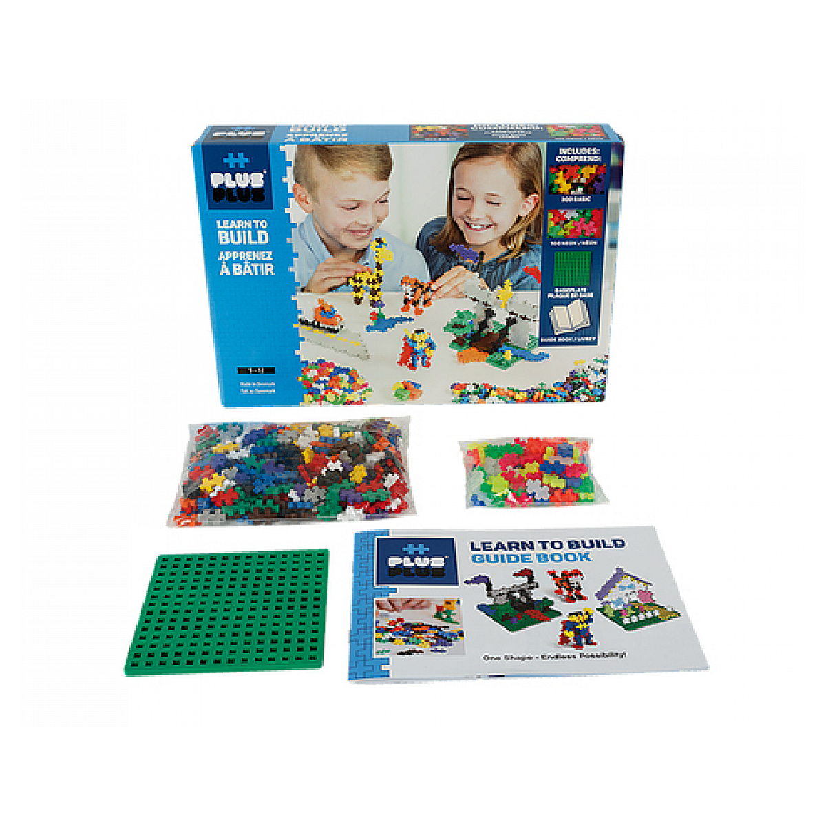 Un set di mattoncini in scatola con bambini sulla scatola. Include mattoncini e guida.