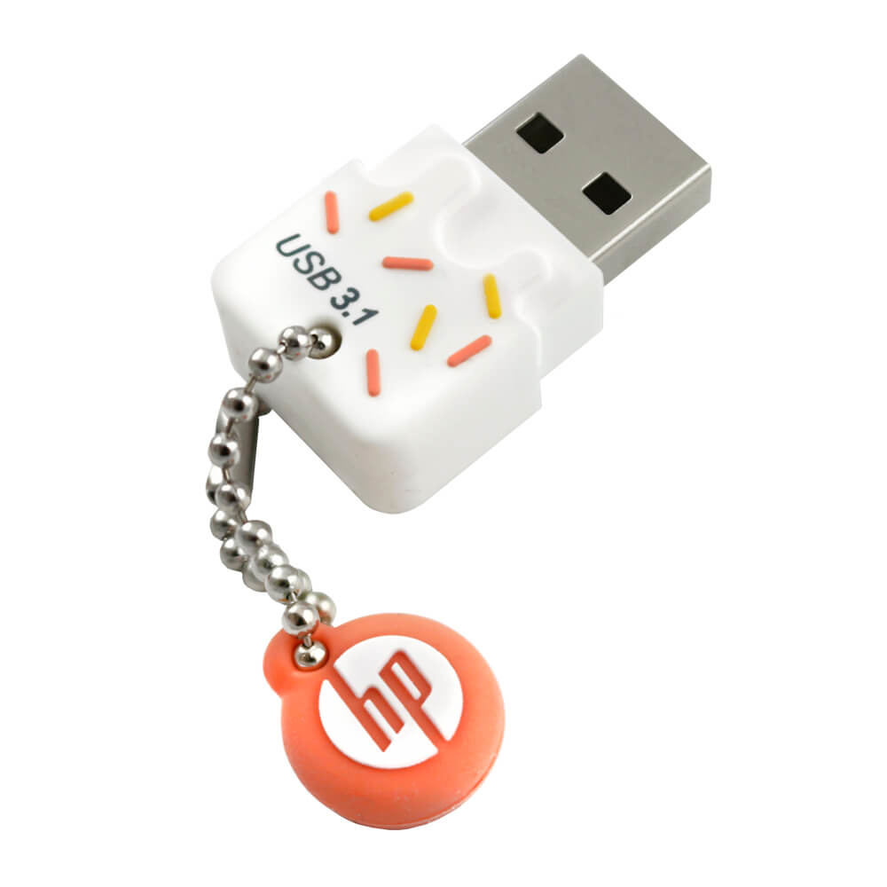 Una memoria USB HP blanca con decoraciones de caramelo y un llavero.