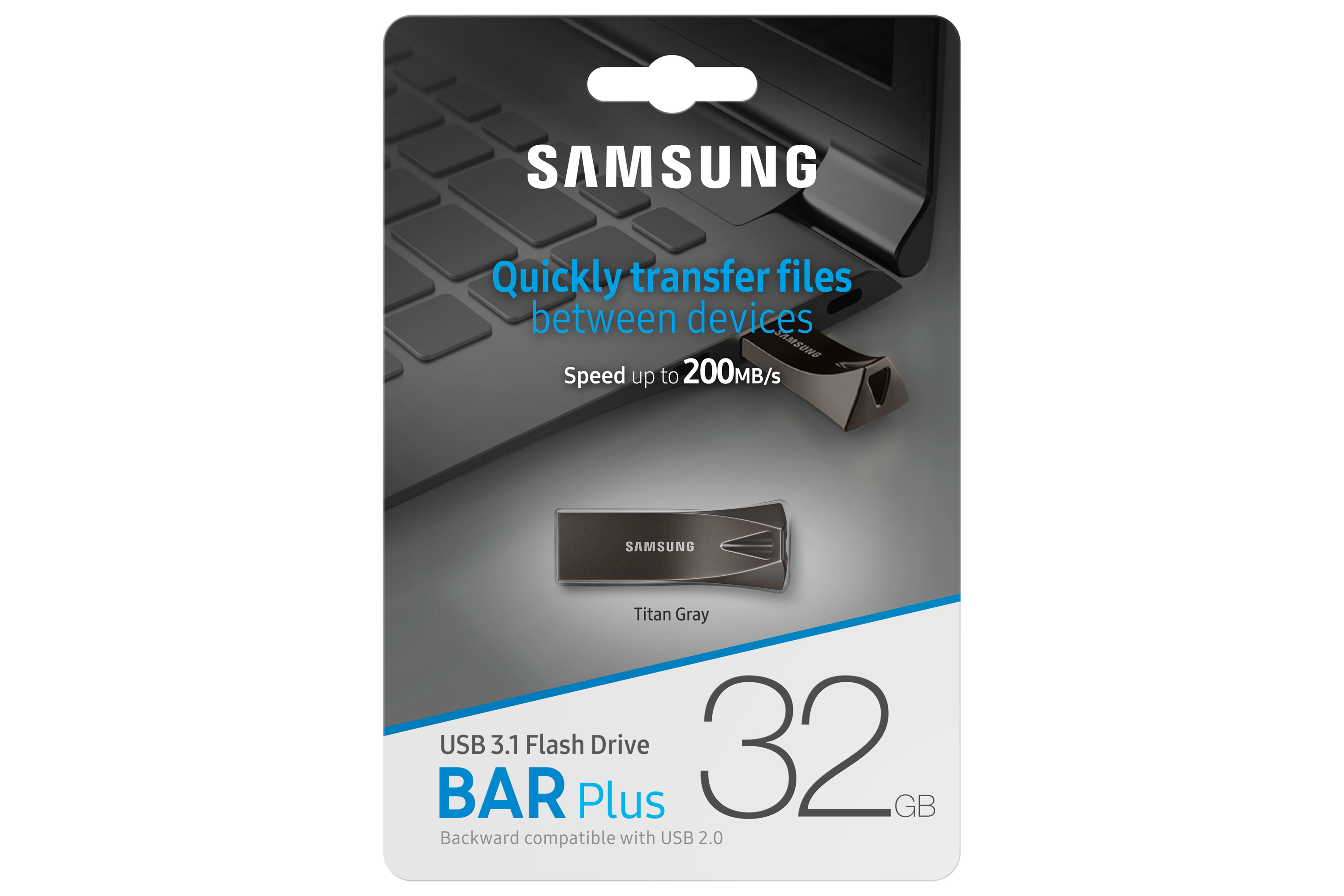 Unidad USB plateada con el logotipo de Samsung y un portátil en el fondo.