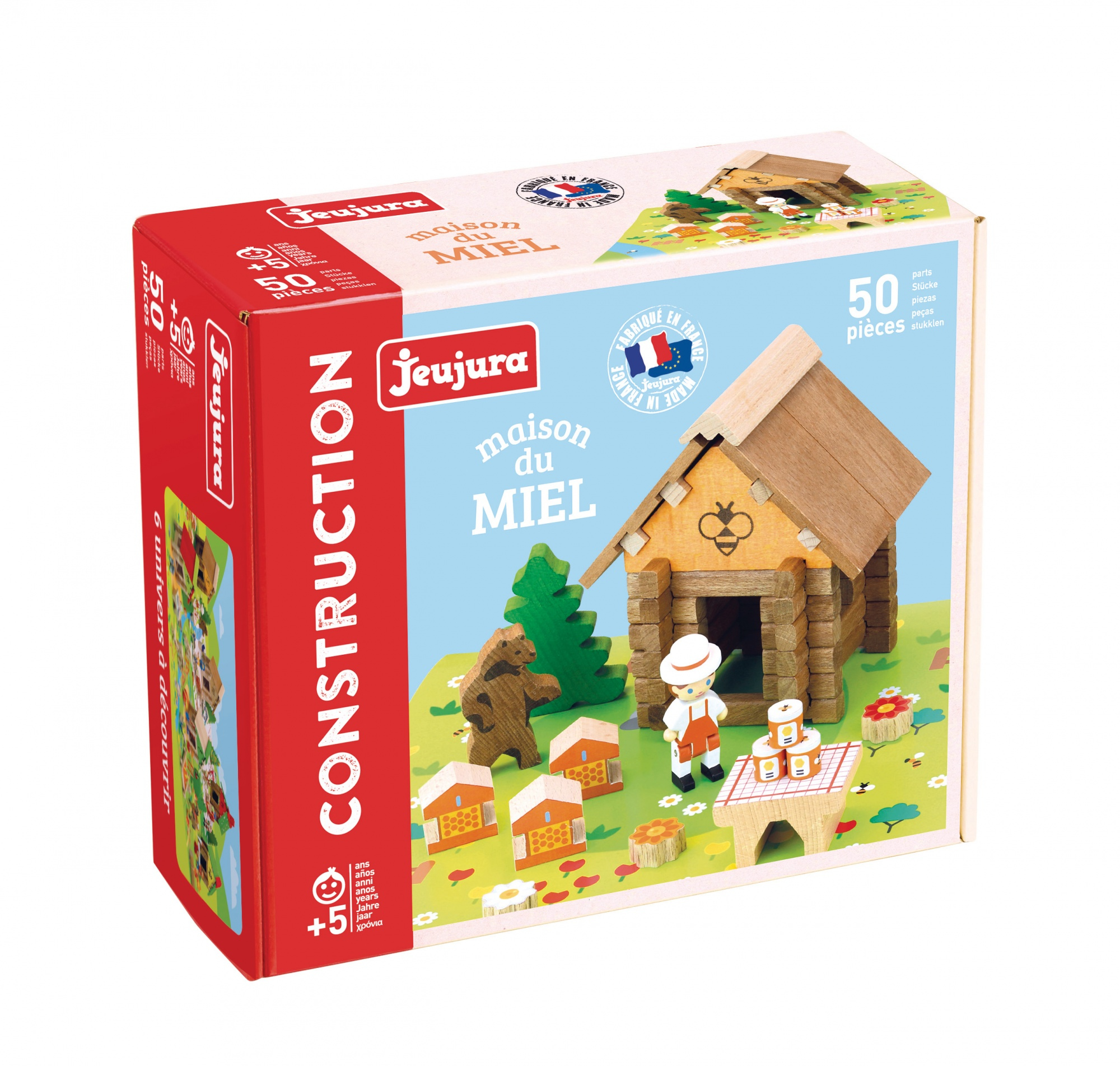 Una casa giocattolo fatta di blocchi di legno. Una scatola con l'immagine della casa e il logo del marchio.