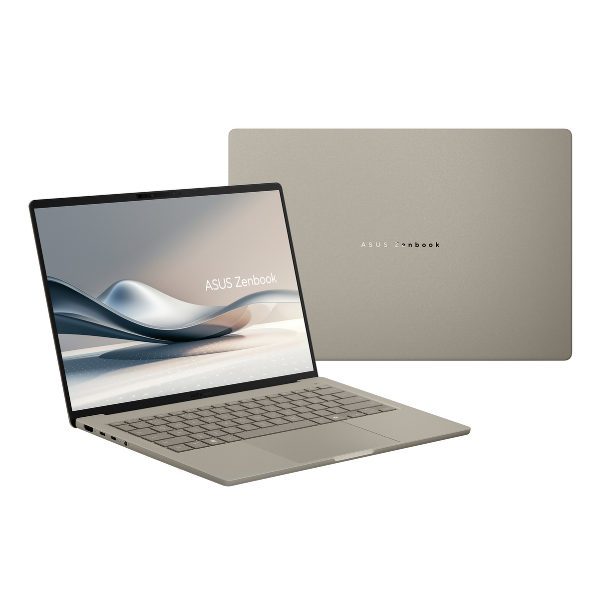 Un portátil ASUS Zenbook de color claro, abierto, mostrando la pantalla. Otro portátil está cerrado en el fondo.