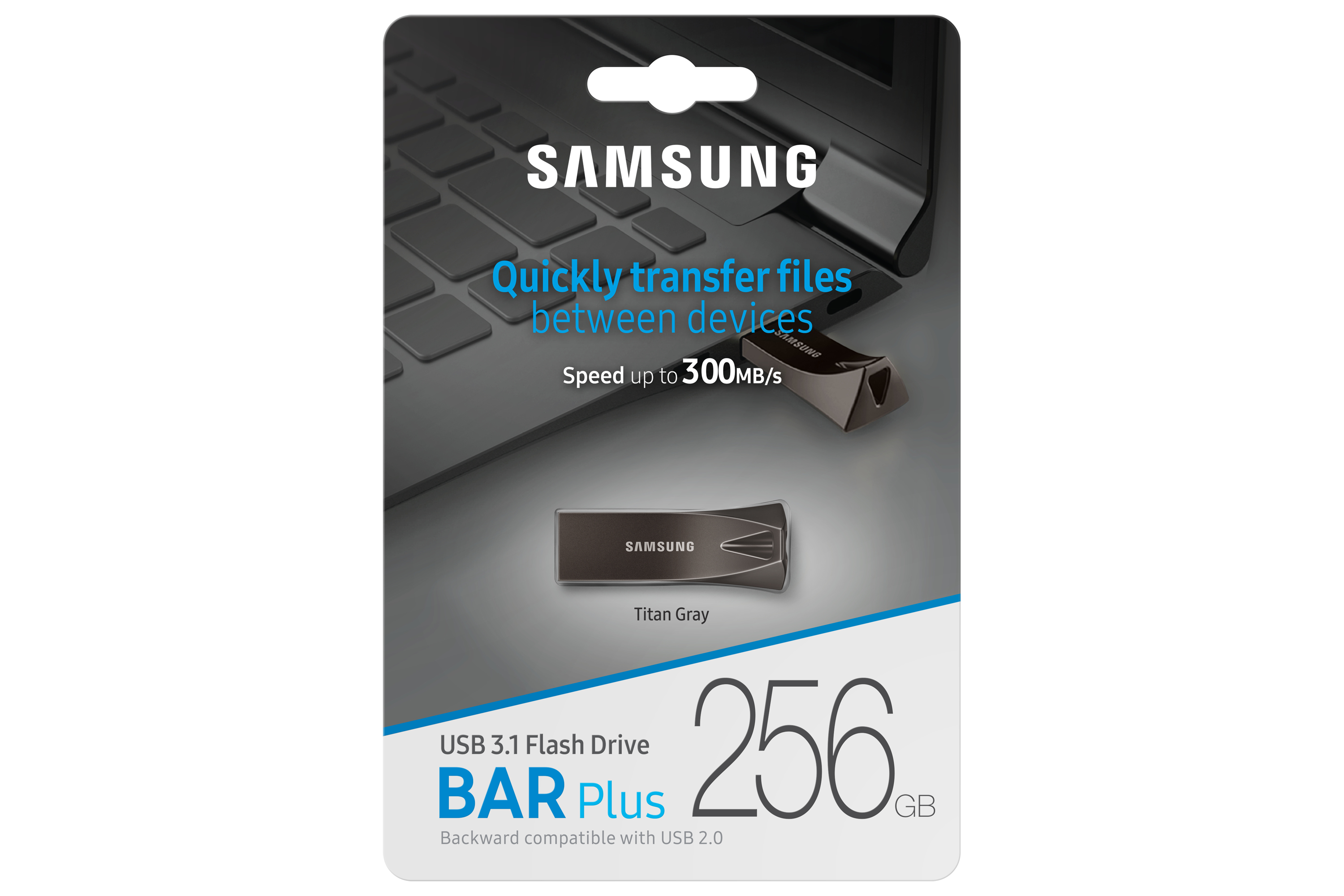 Pendrive w opakowaniu, na laptopie. Marka: Samsung, model: BAR Plus, 256GB.