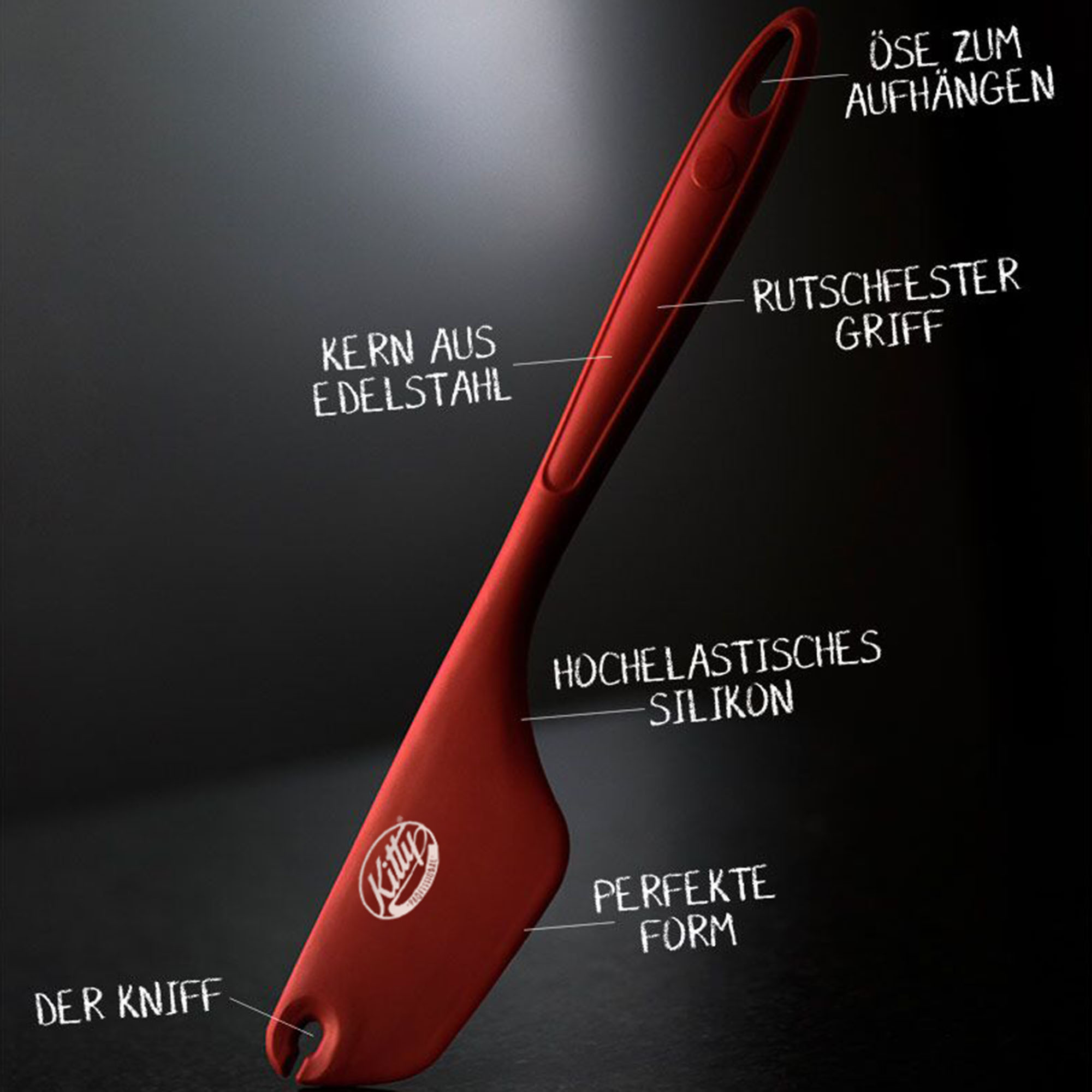Roter Silikonspatel mit Stahlkern zum Kochen. Hat perfekte Form und Aufhängeschlaufe.