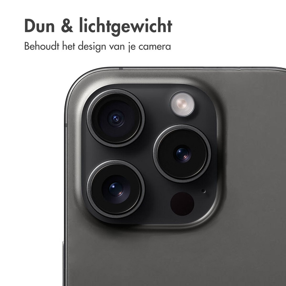 Gros plan de l'appareil photo d'un téléphone gris foncé avec trois objectifs noirs et un flash.