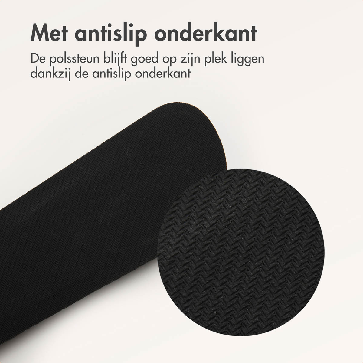 Close-up of a black anti-slip mousepad with a textured surface, and a zoomed in circle.