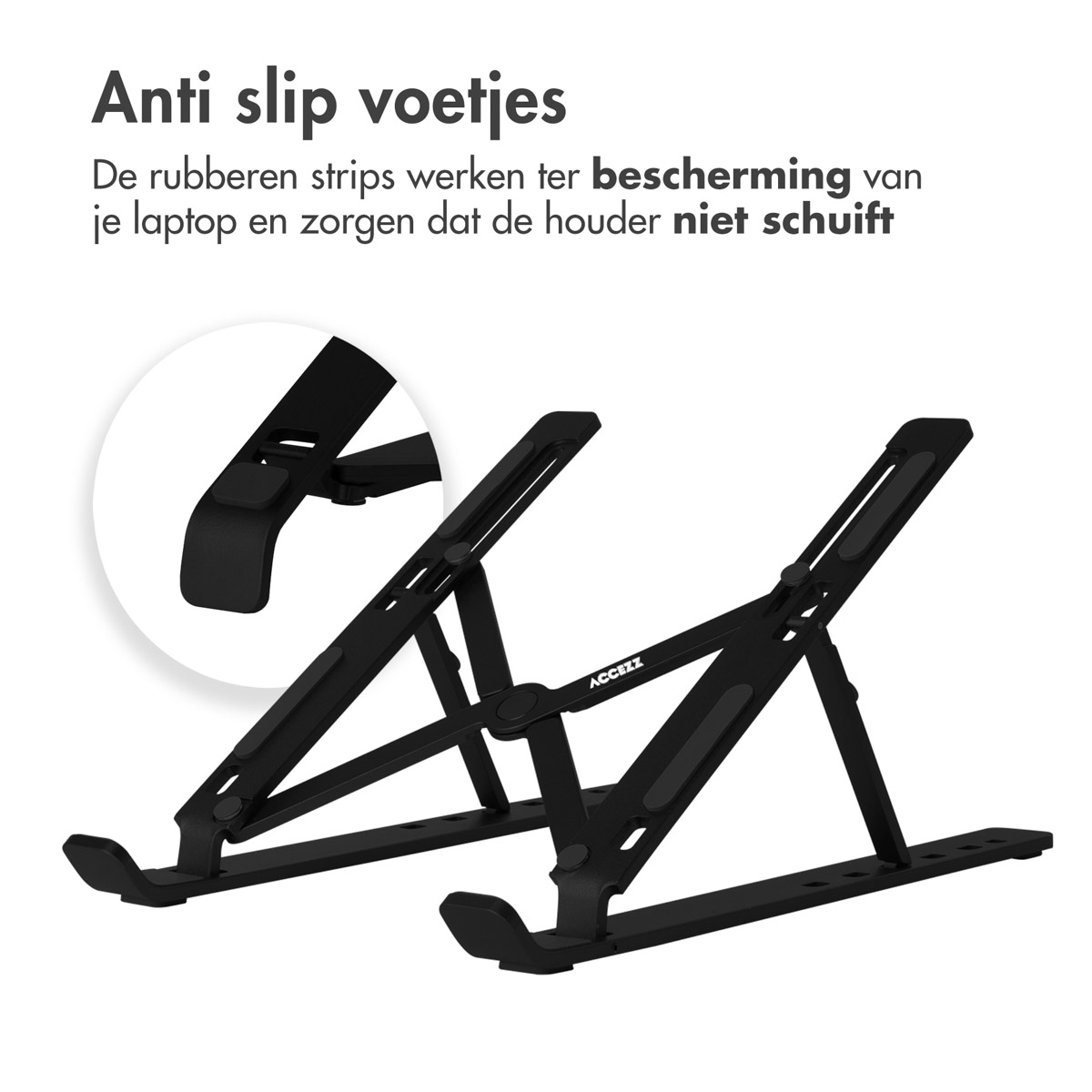 Black laptop stand with non-slip feet. The stand is angled and has a close-up view.