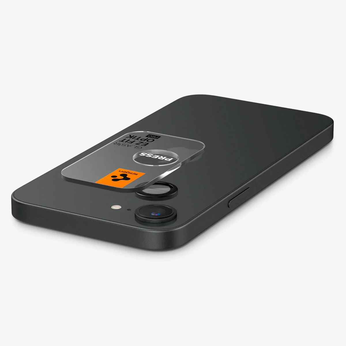 Czarny telefon z dołączoną osłoną obiektywu aparatu. Ochraniacz ma słowo PRESS.