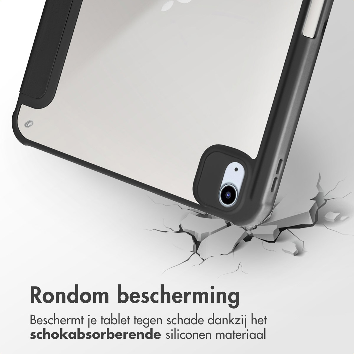 Tablet in a black case, corner detail, cracked surface.