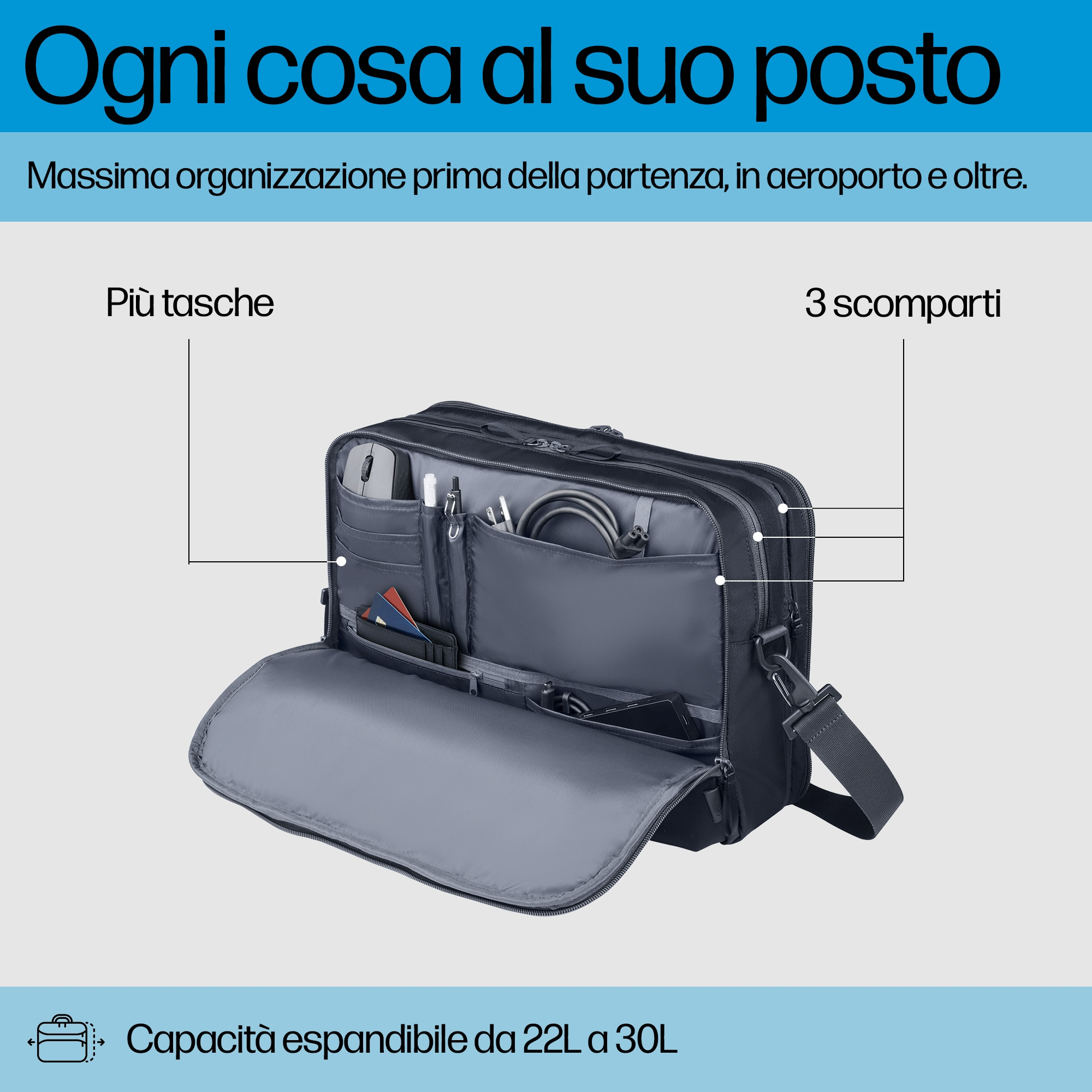 Una borsa per laptop nera aperta con scomparti, che mostra oggetti all'interno e informazioni sulla capacità espandibile.