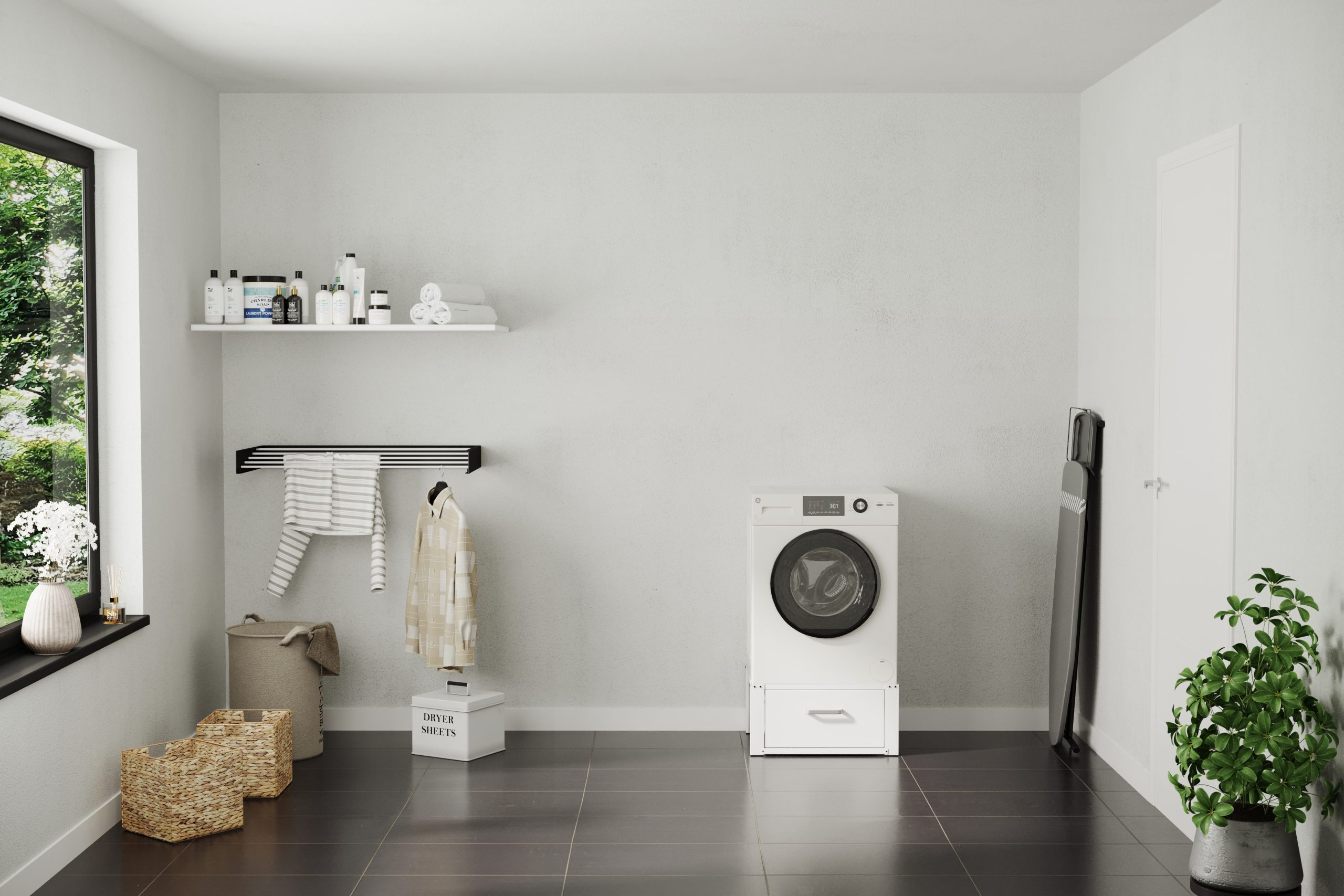 Laundry room with a washing machine, a drying rack, and laundry items, on a white wall.