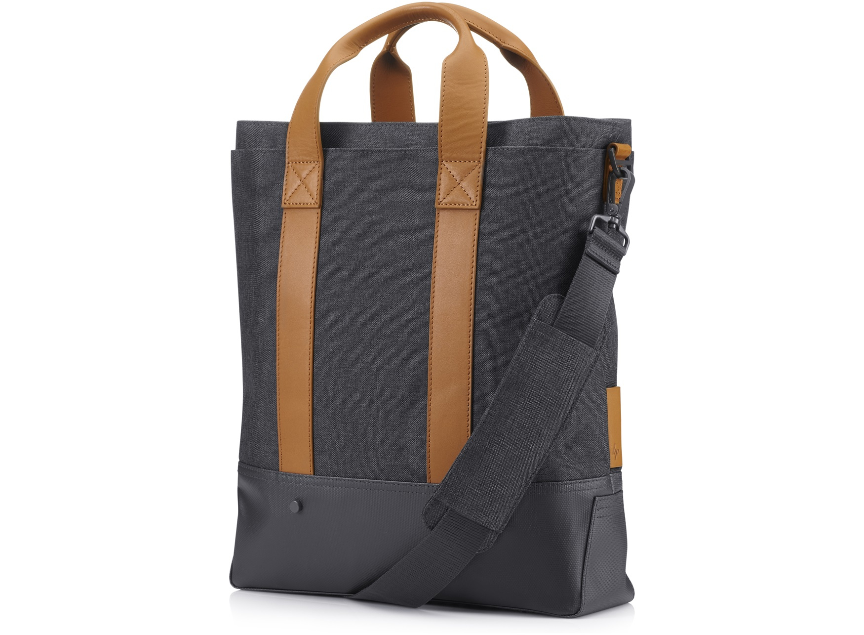 Bolso tote gris y negro con asas marrones y correa para el hombro.