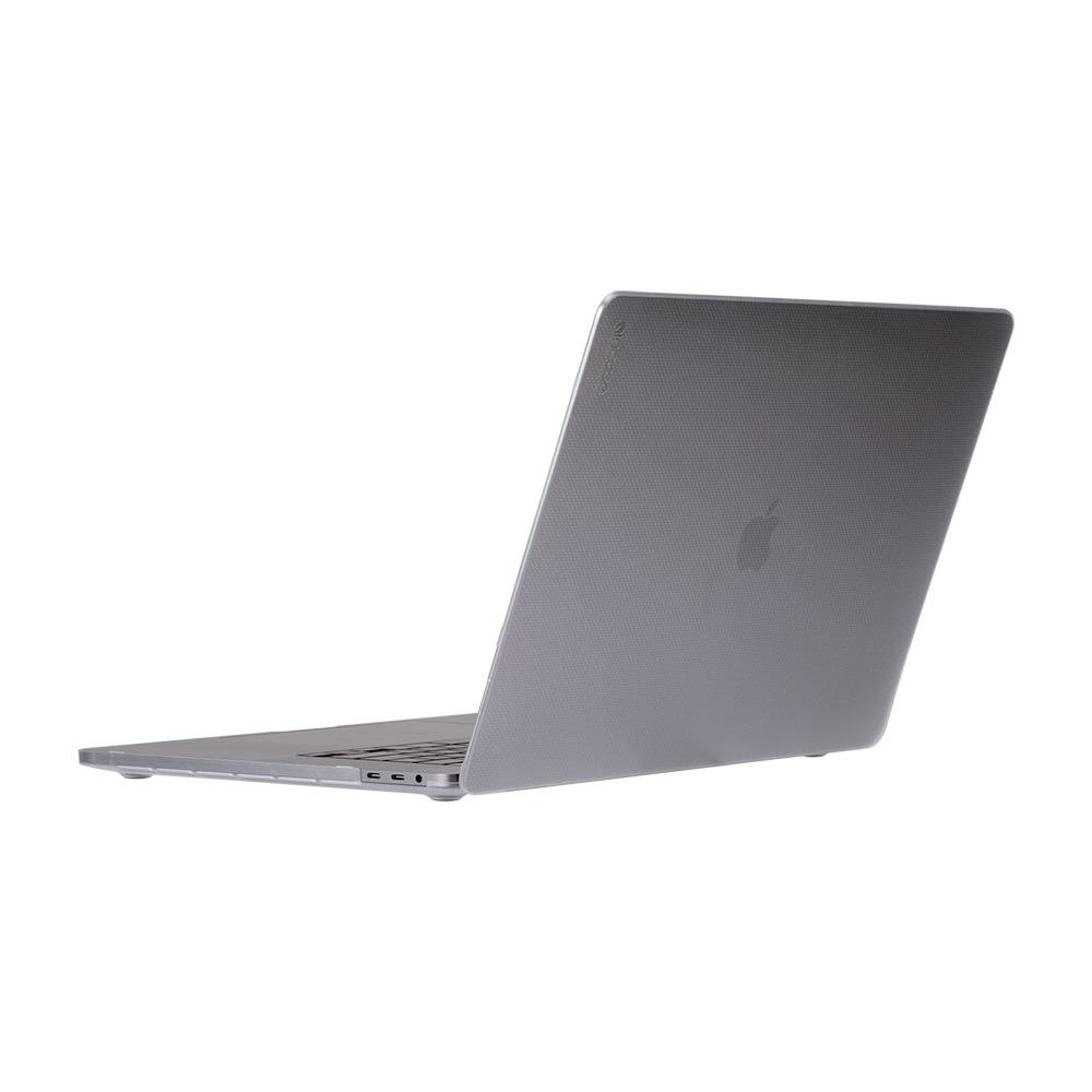 Un laptop grigio visto da dietro, con il logo Apple. La superficie ha un motivo.