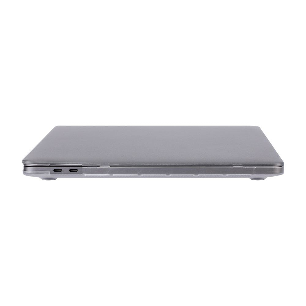 Laptop grigio, chiuso, su una superficie bianca. Mostra le porte sul lato.