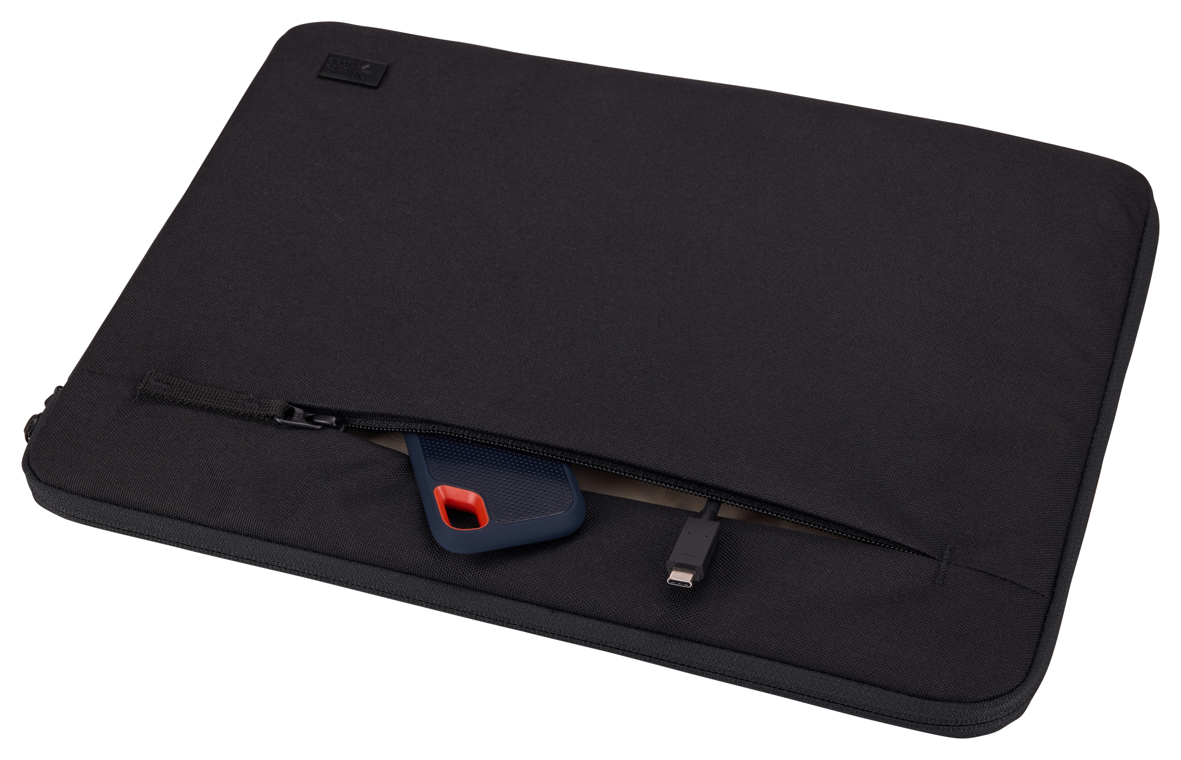 Black laptop sleeve with a zipper, a phone and a USB-C cable are inside.