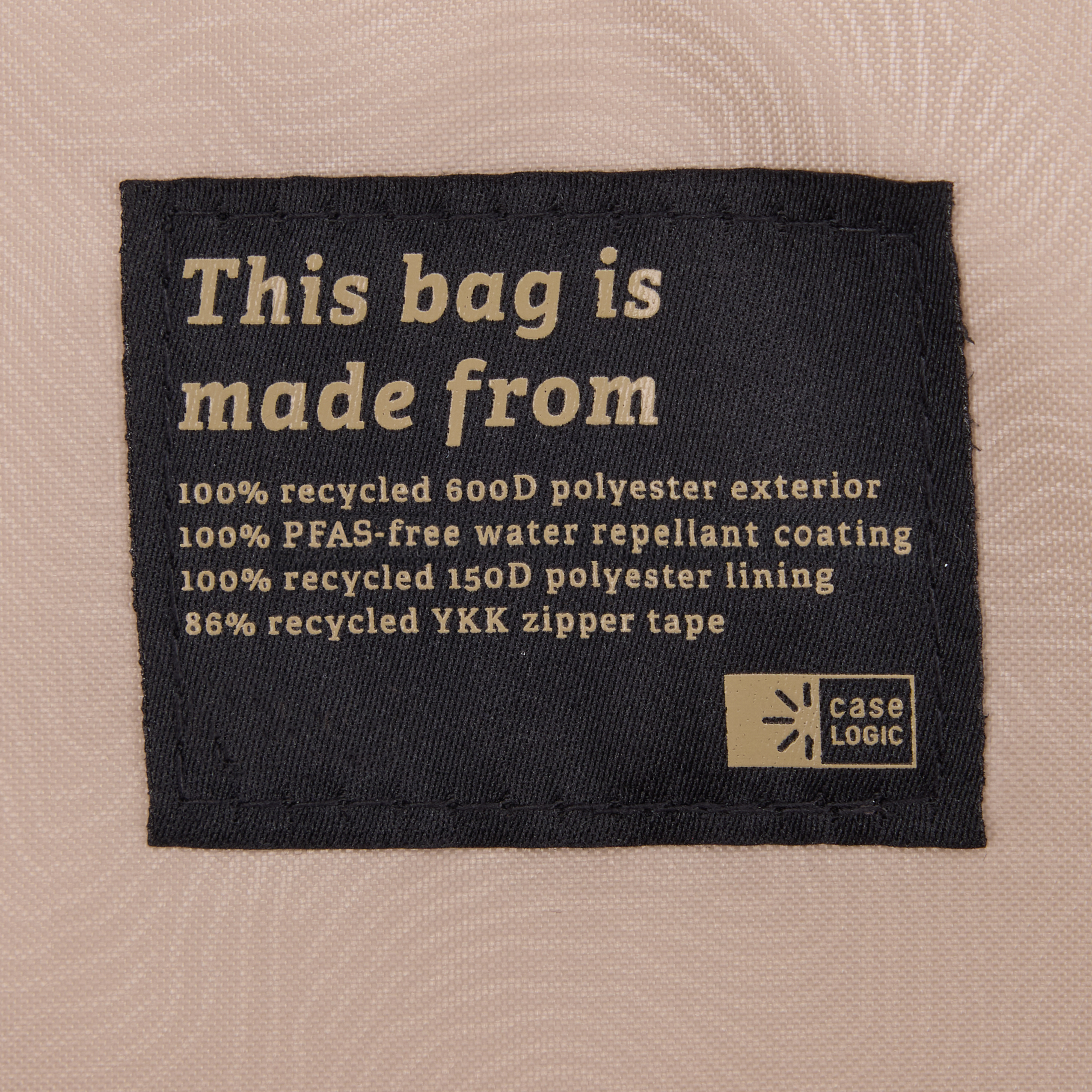 Black label with text. It says: 'This bag is made from' and details about material.