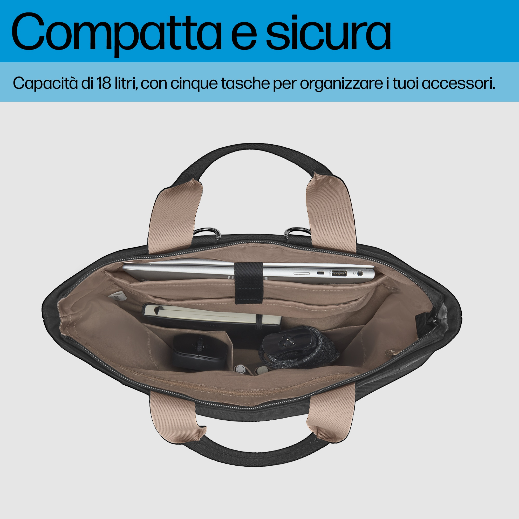 Borsa nera per laptop aperta con dettagli beige, contenente un laptop, mouse e altri accessori.