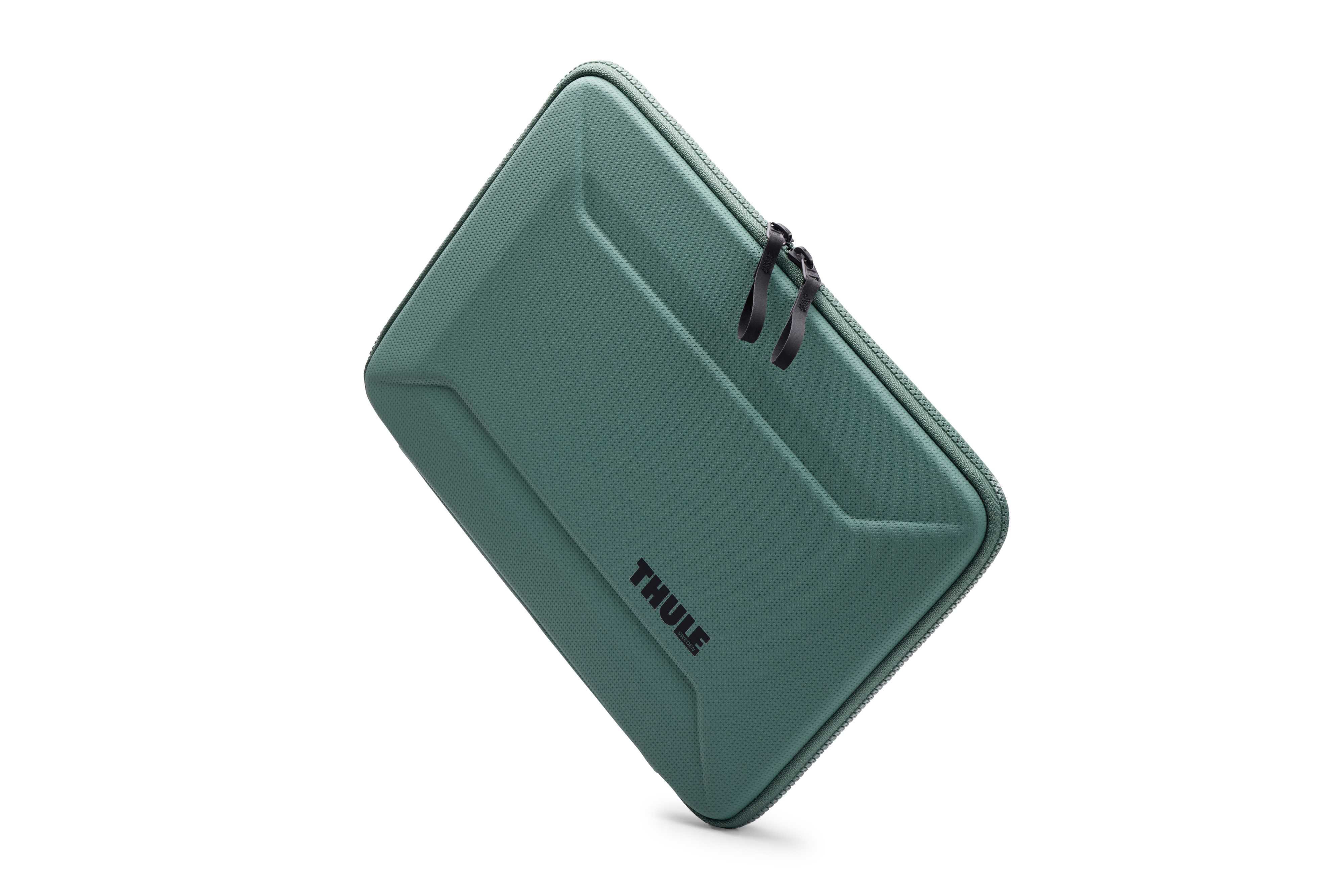 Custodia verde Thule per laptop, chiusa, con superficie testurizzata e cerniera.