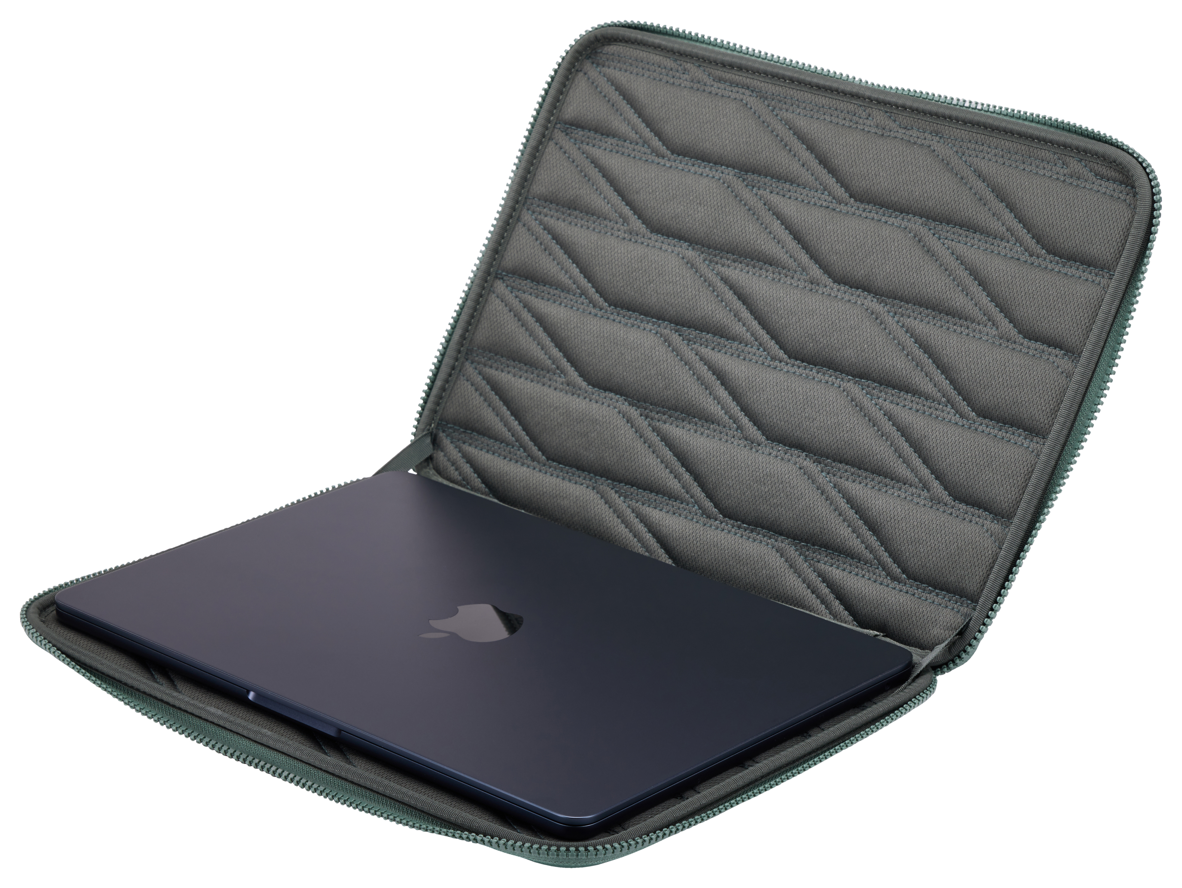 Laptop in una custodia verde.