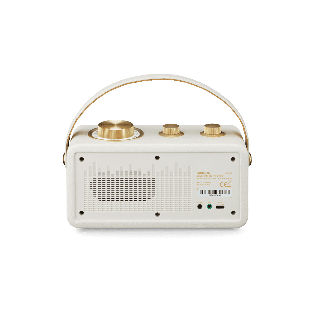 Una radio blanca con perillas doradas y un asa. Tiene un altavoz y una etiqueta.