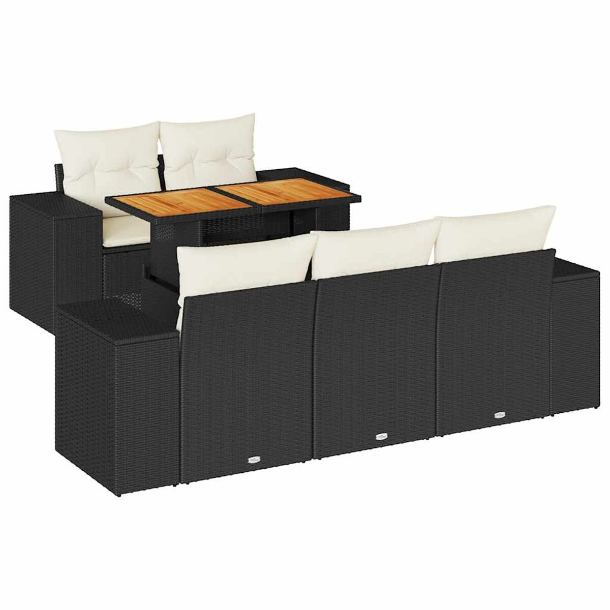 Set divano componibile da esterno in vimini nero con cuscini color crema e tavolo in legno.