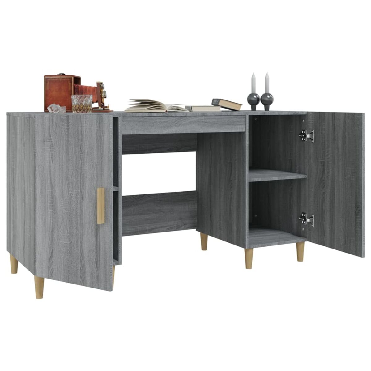 Ein grauer Holzschreibtisch mit offenen Fächern, Büchern, Kerzen und Dekorationen.