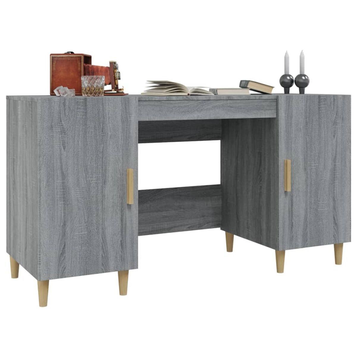 Grauer Holzschreibtisch mit Schubladen und Schränken, und Gegenstände oben. Zwei Kerzen und ein Glas sind sichtbar.